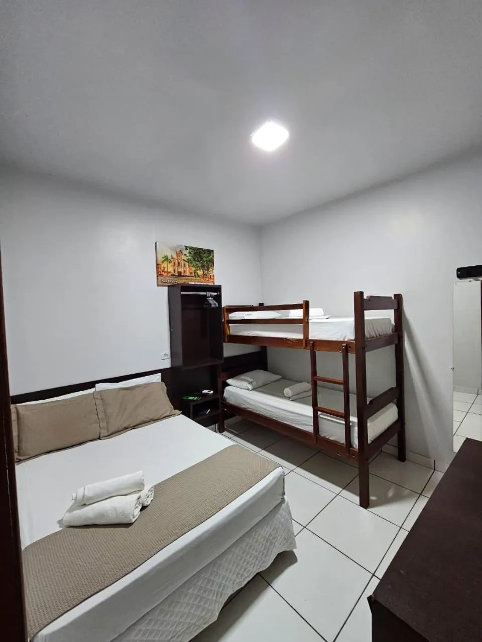 Photo of the whole room, Bed in New Center Hotel