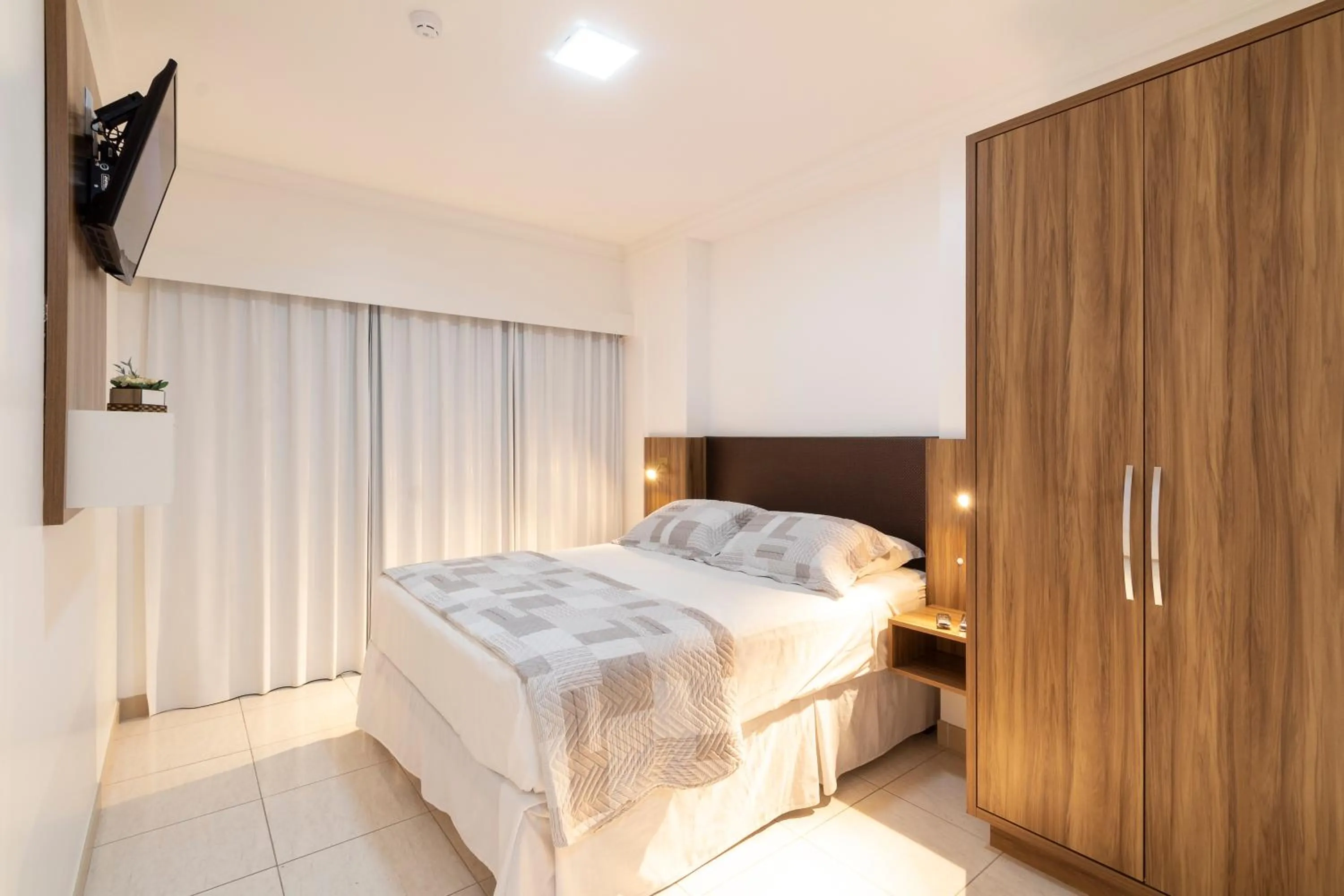 Bed in Pousada Riviera Bombinhas