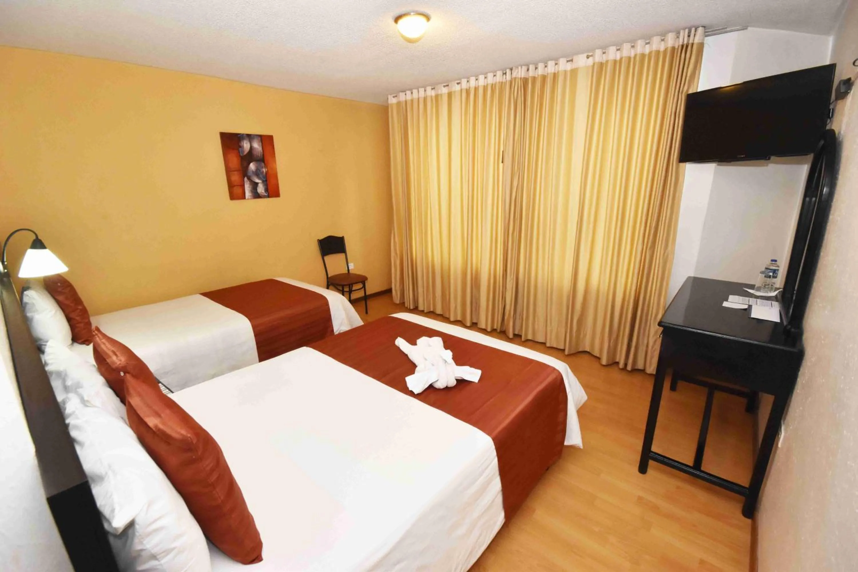 Bed in Hotel Montecarlo