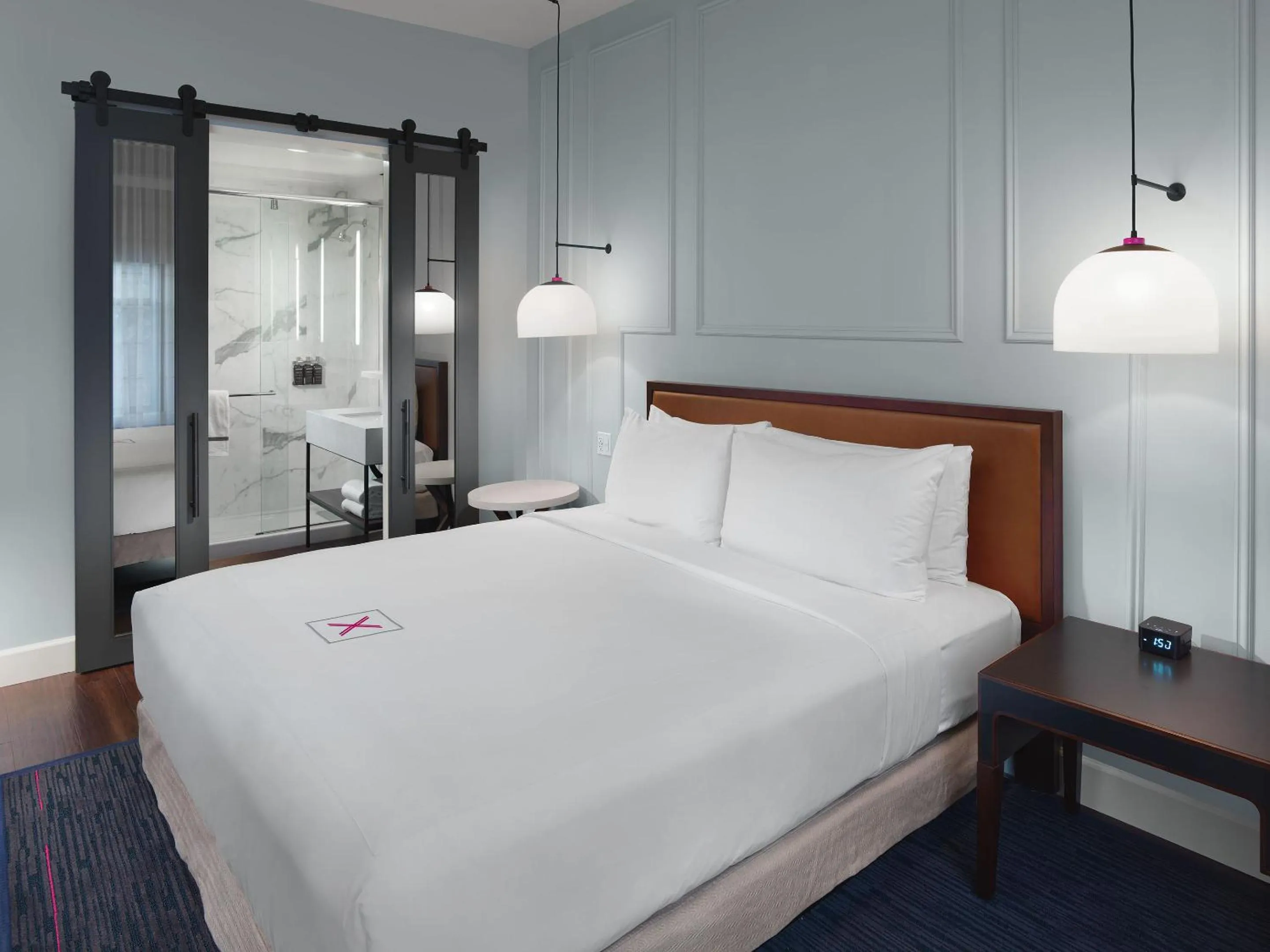 Photo of the whole room, Bed in Axiom Hotel