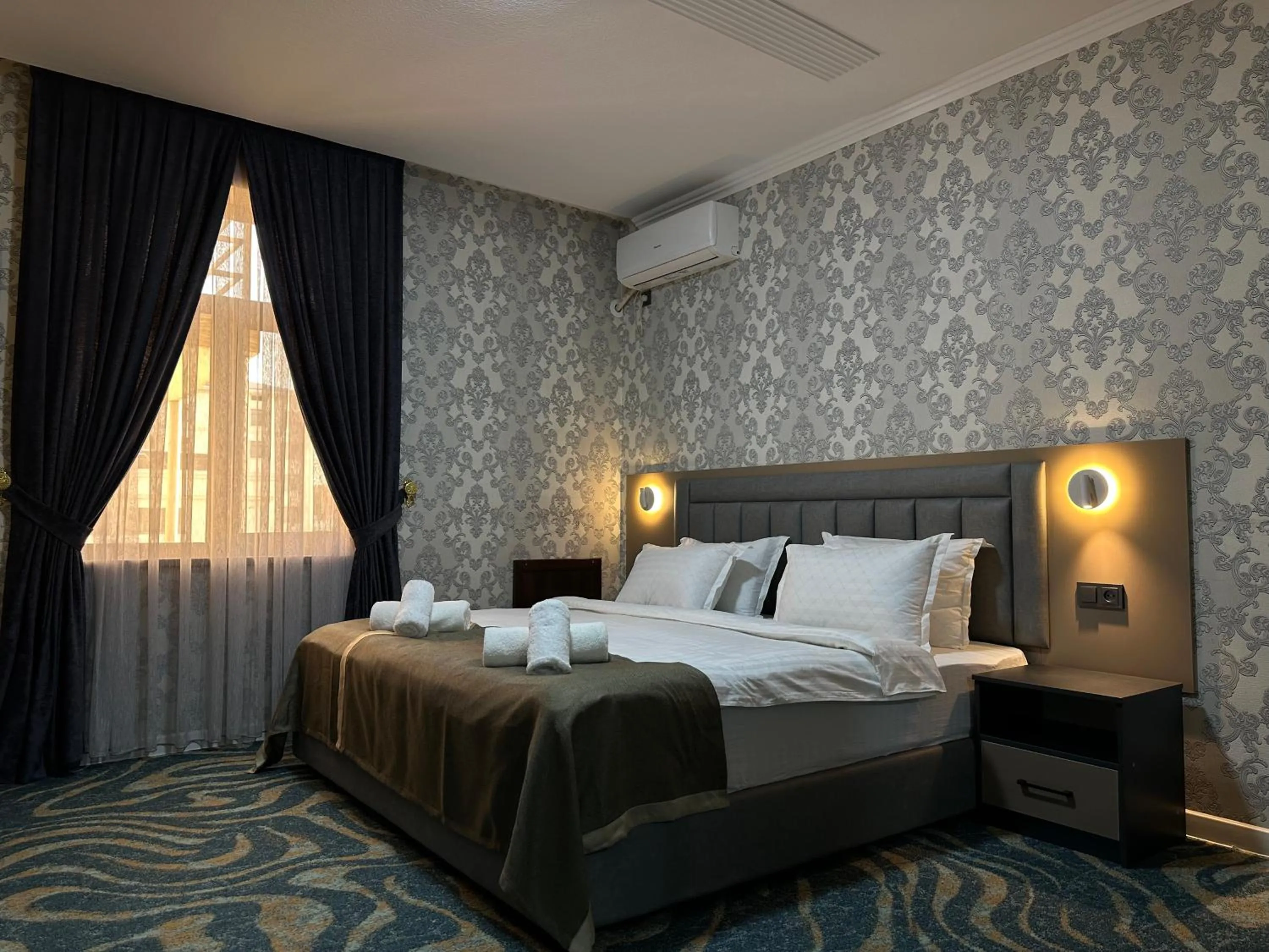 Bed in Reikartz Grand Kokand