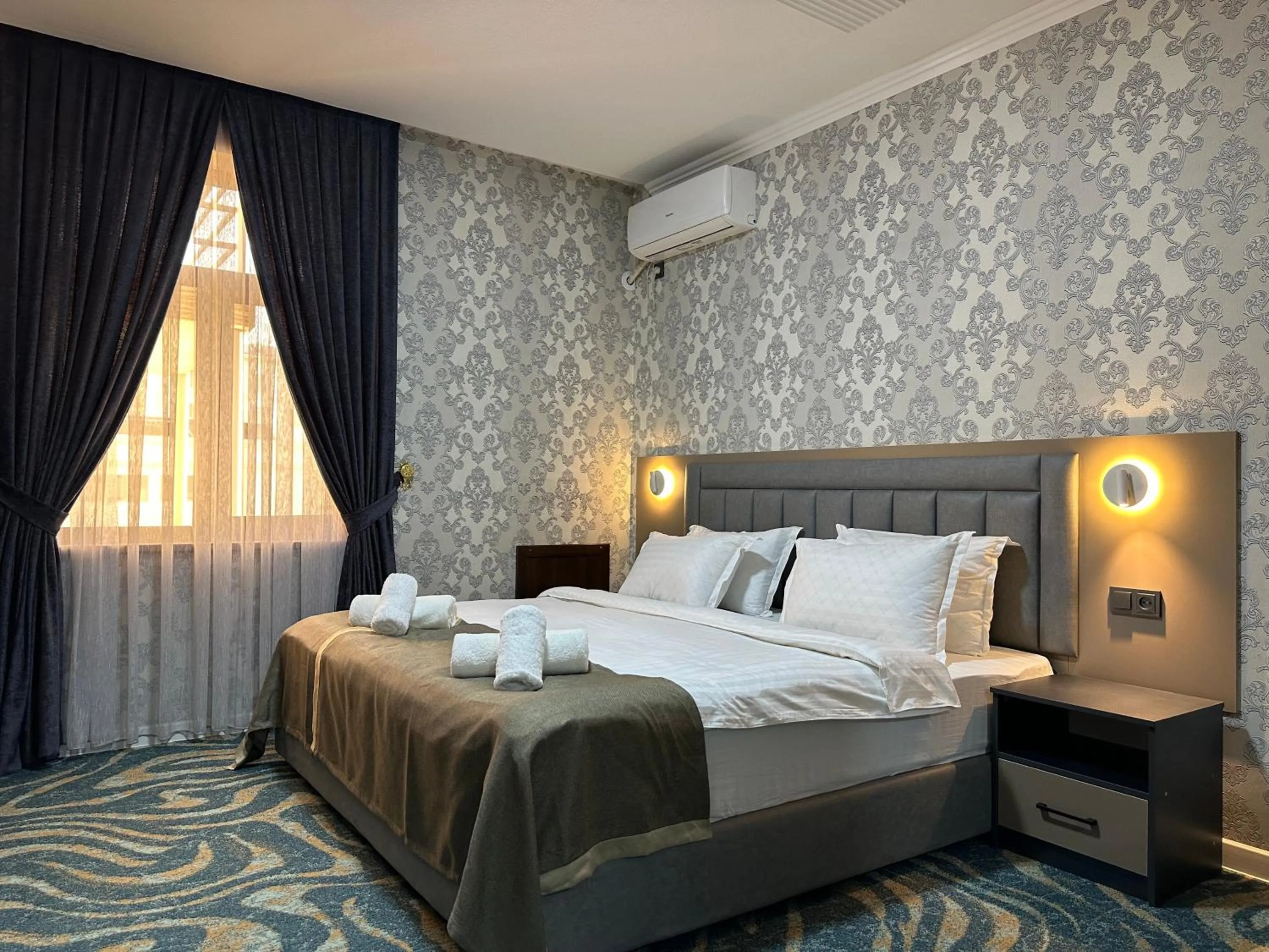Bed in Reikartz Grand Kokand