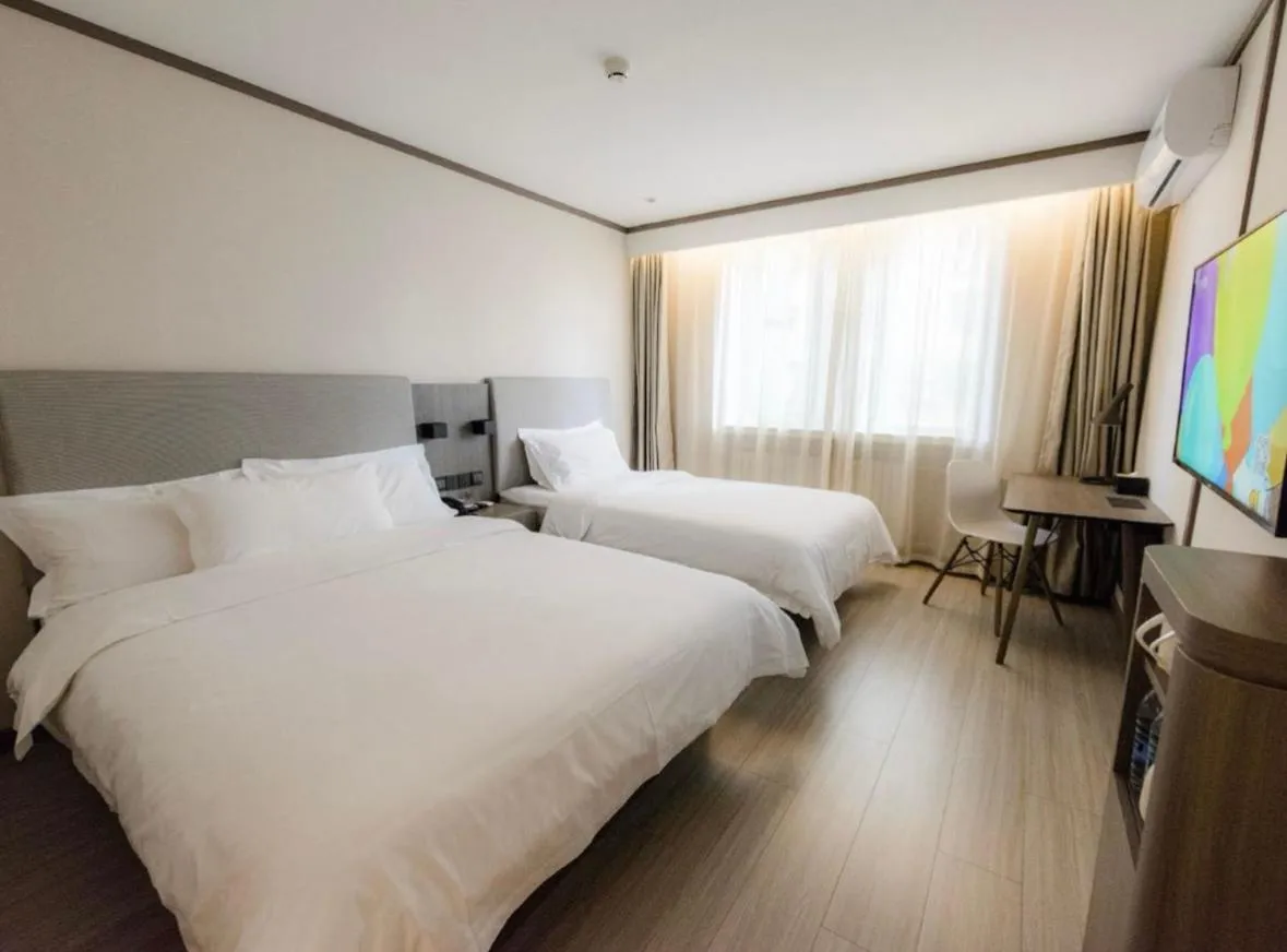 Bed in Hanting Beijing Chaoyang Railway Station Hotel