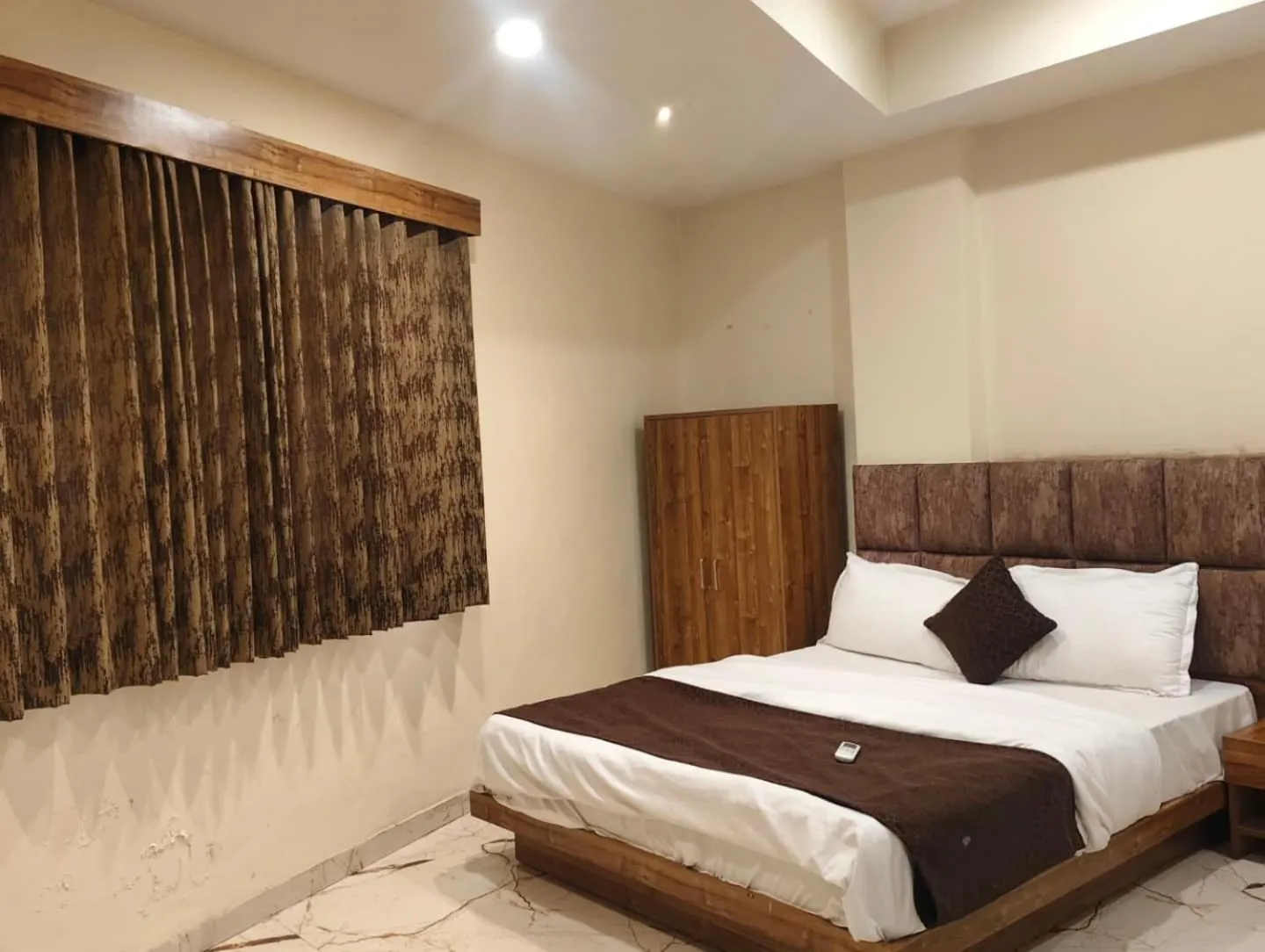 Bed in Hotel Signature
