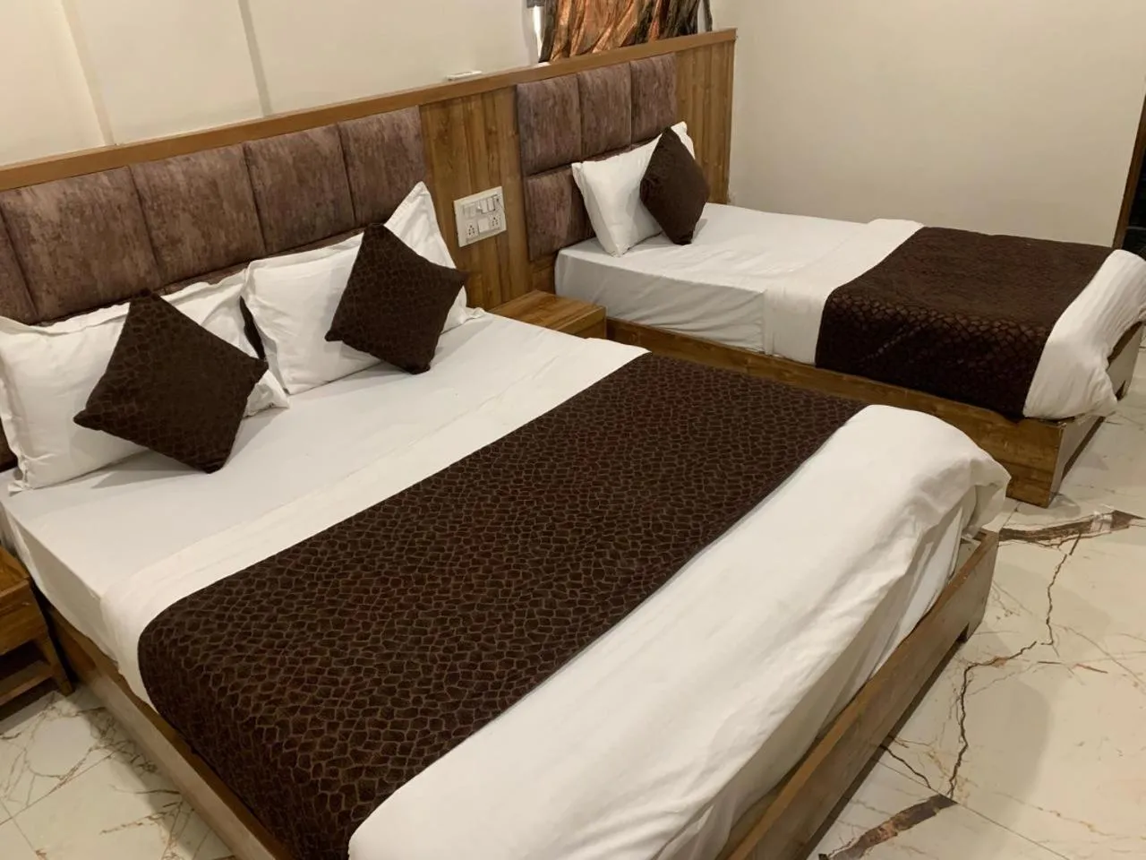 Bed in Hotel Signature