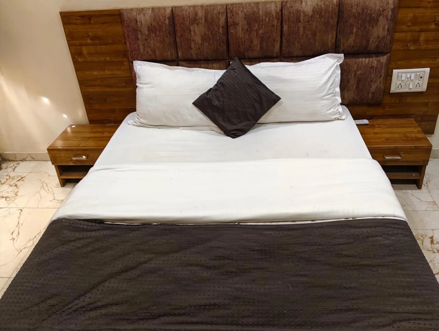 Bed in Hotel Signature