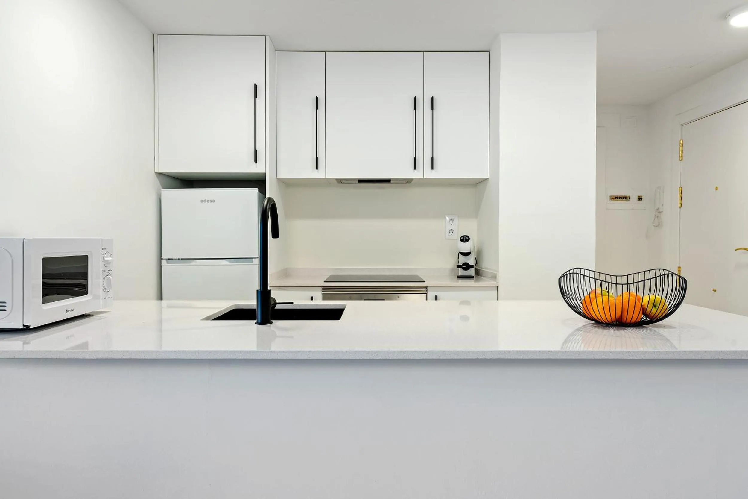 Kitchen or kitchenette in AQUAMARINA II Apartments