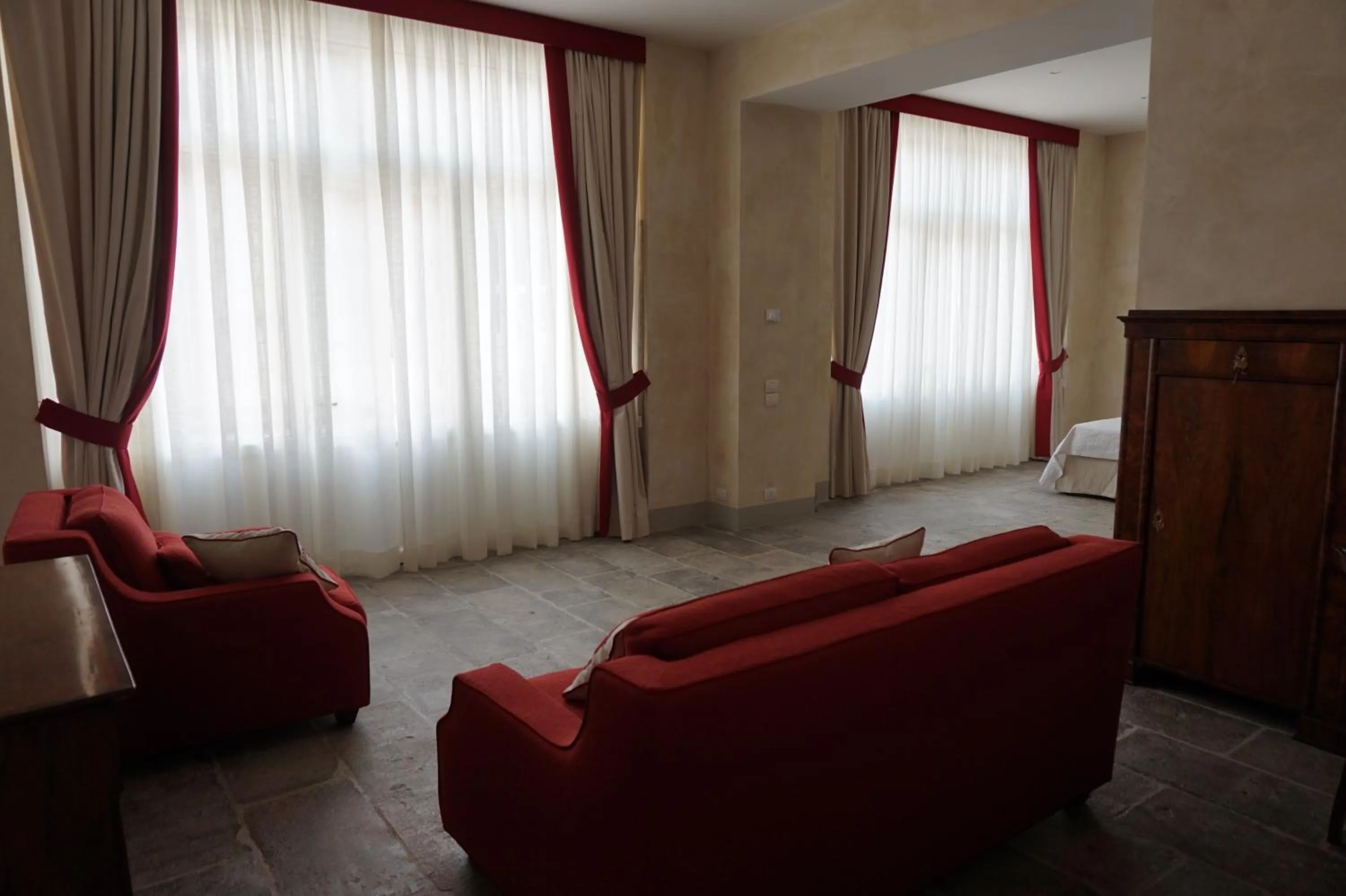 Living room, Bed in Palazzo Mantua Benavides Suites & Apartments