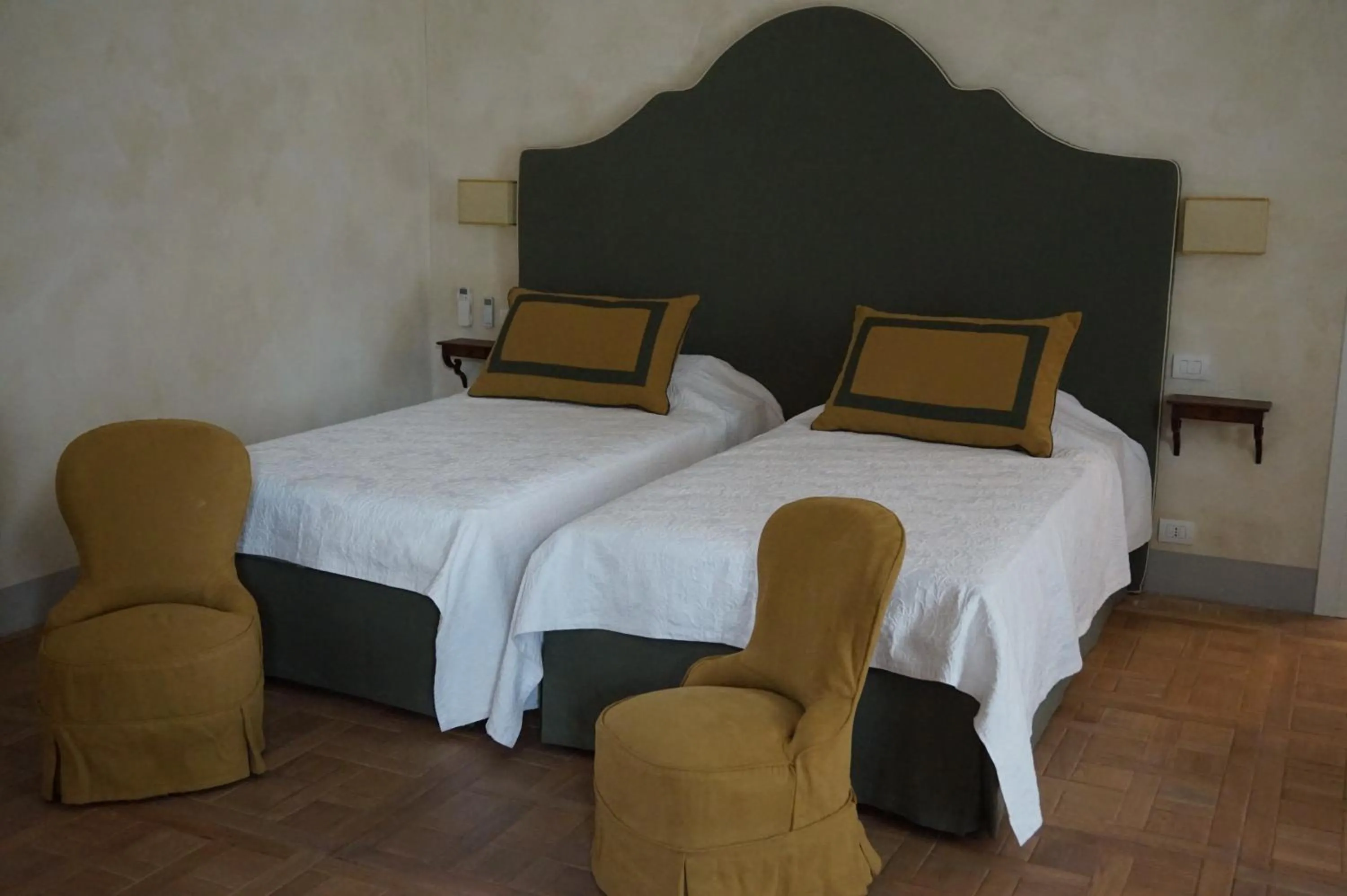 Bed in Palazzo Mantua Benavides Suites & Apartments