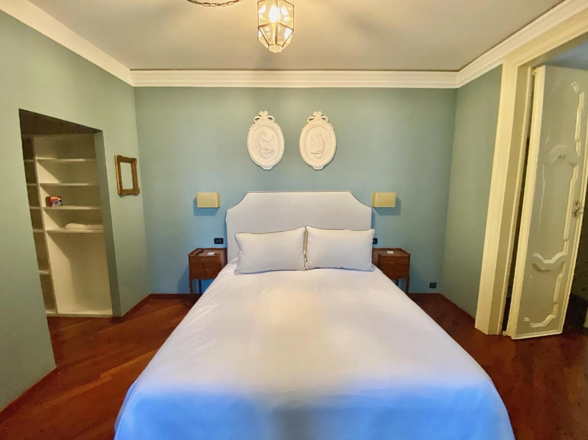 Bed in Palazzo Mantua Benavides Suites & Apartments