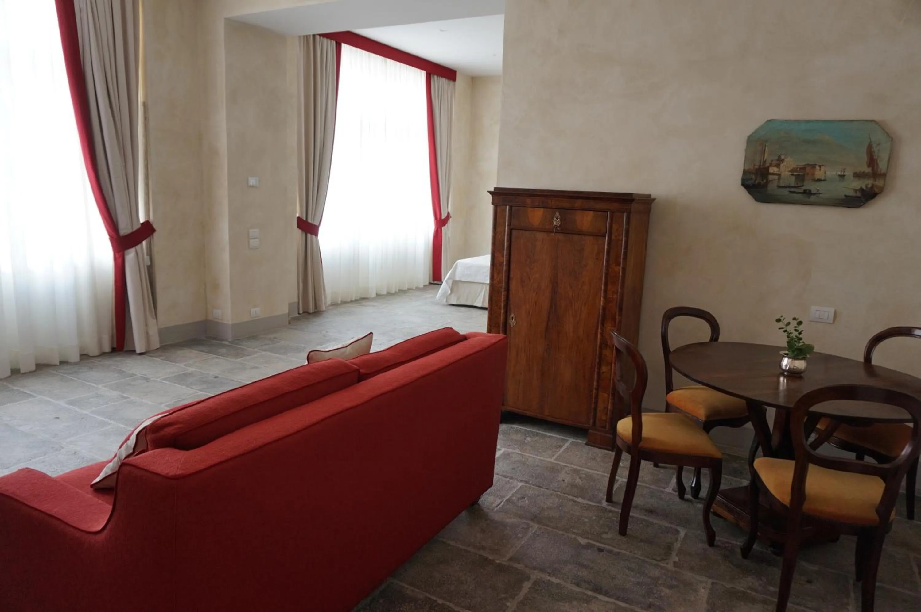 Living room, Bed in Palazzo Mantua Benavides Suites & Apartments