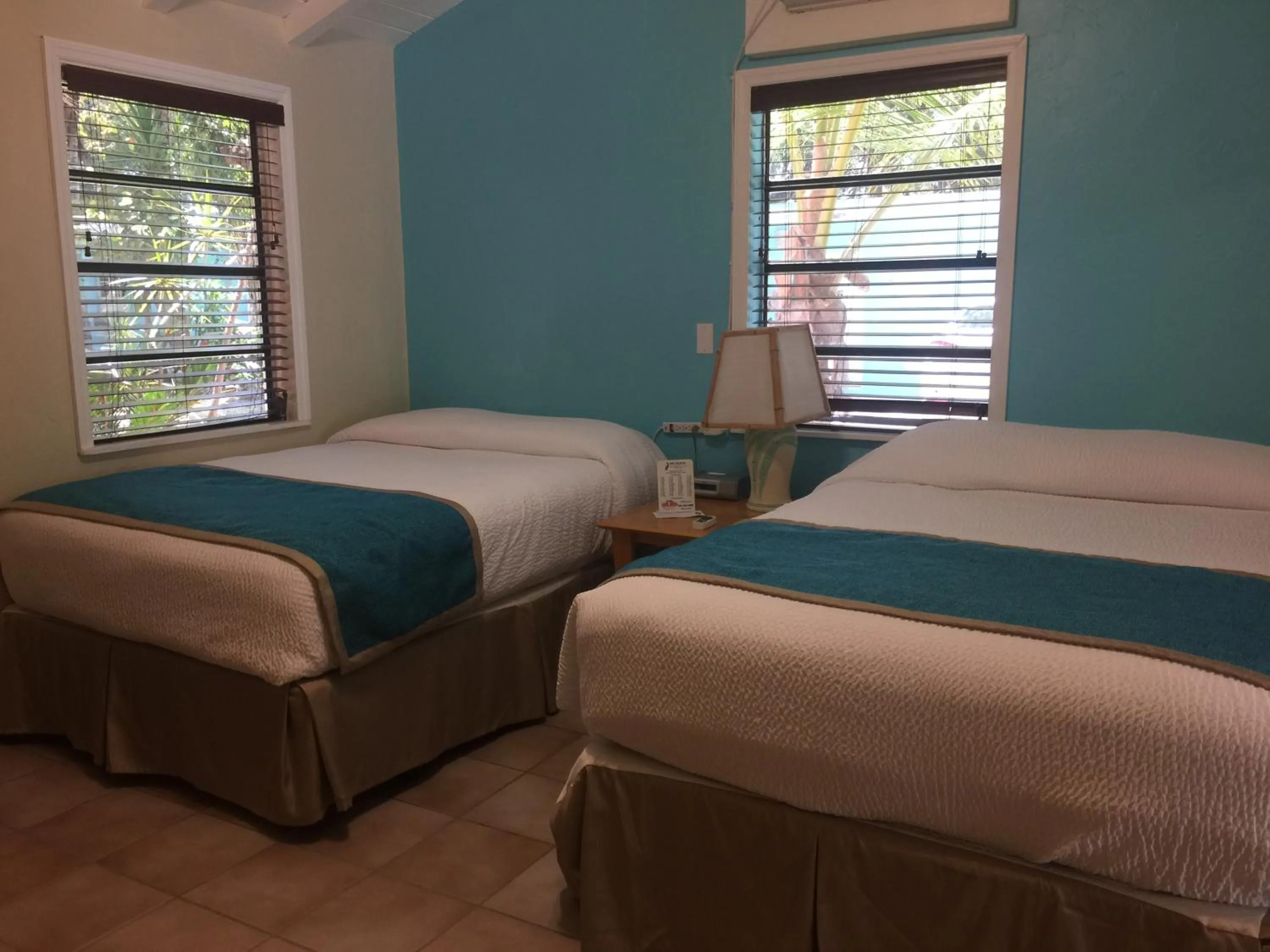 Bed in The Pelican Key Largo Cottages