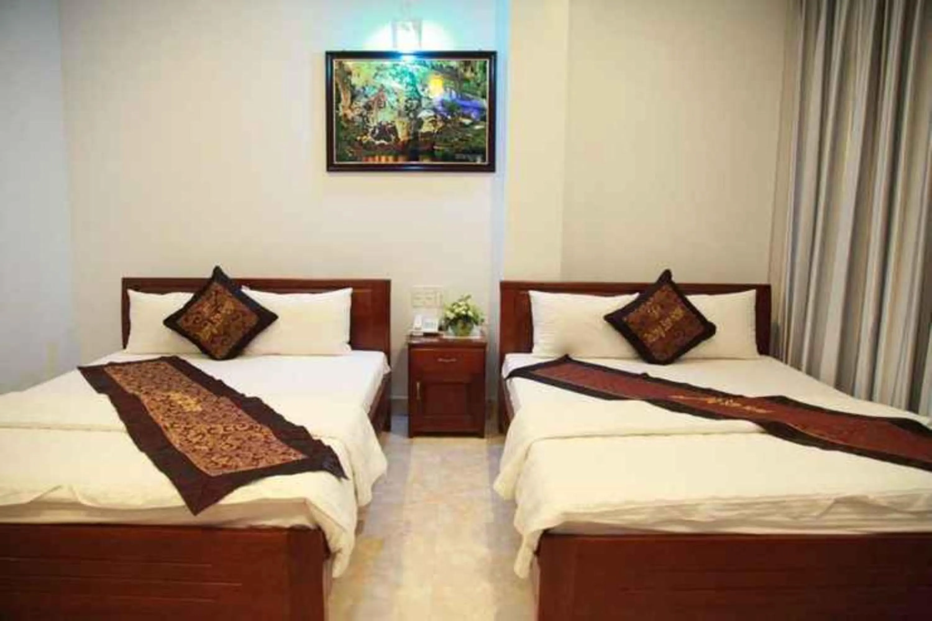Bed in Tan Truong Son Hotel