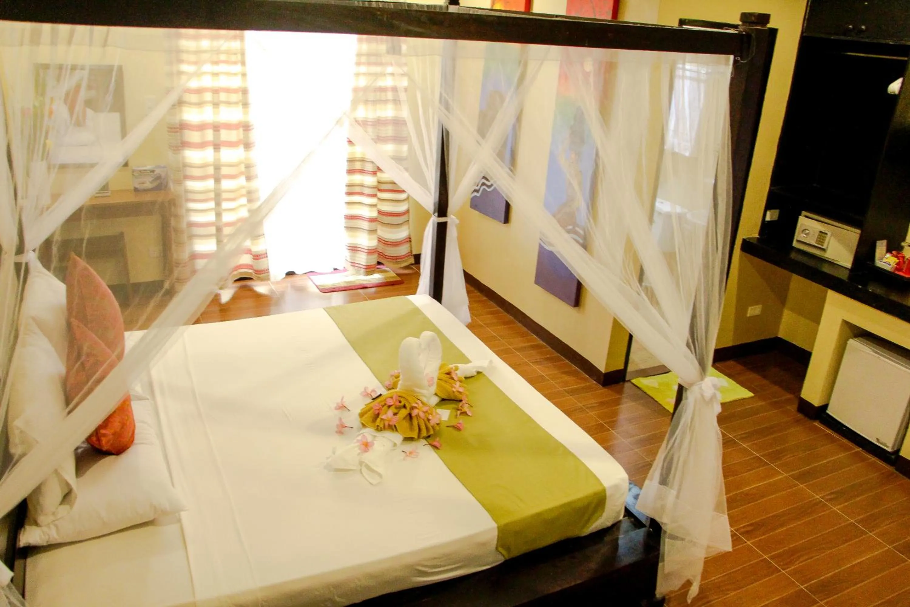 Bed in Sulu Sea Boutique Hotel