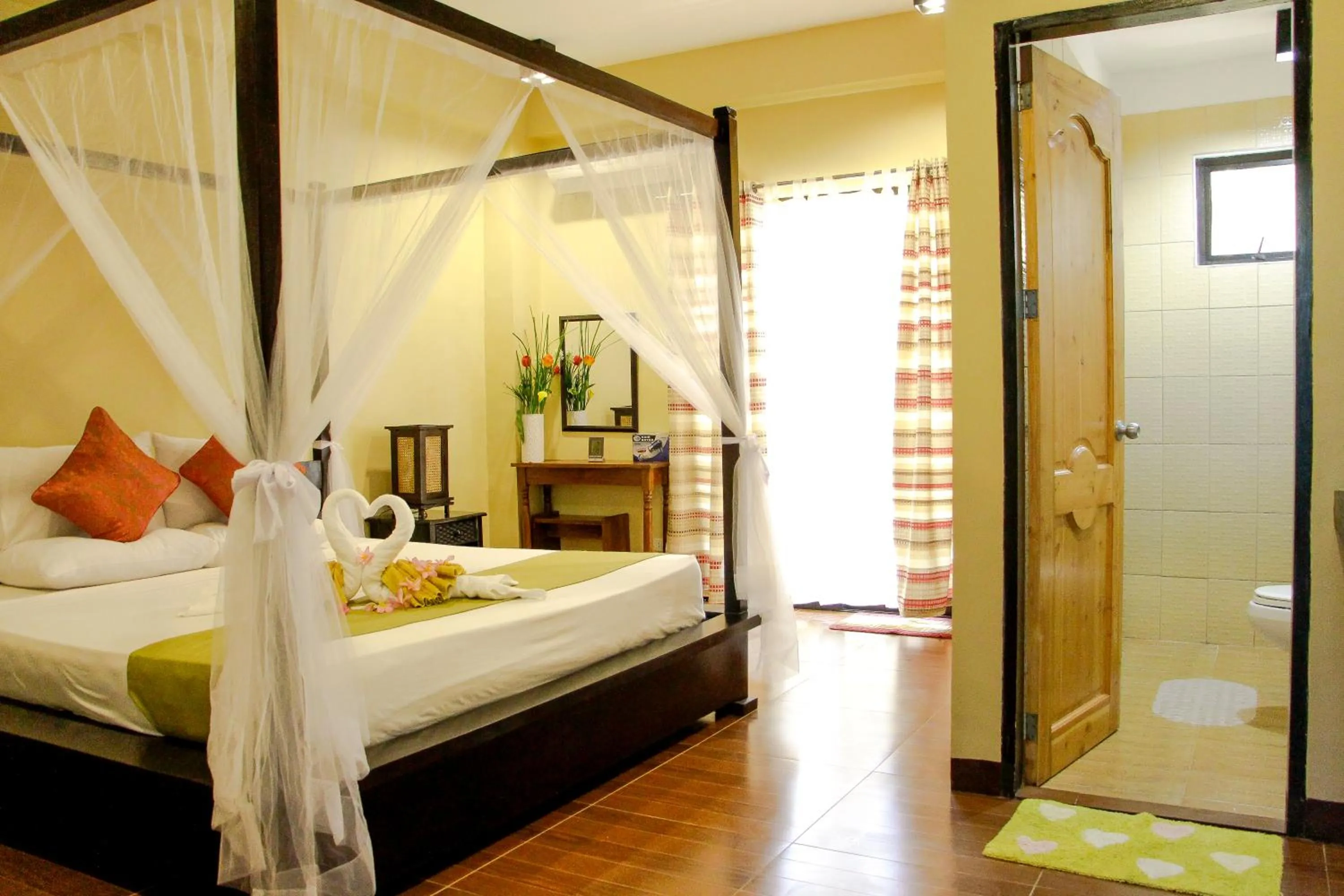 Bed in Sulu Sea Boutique Hotel