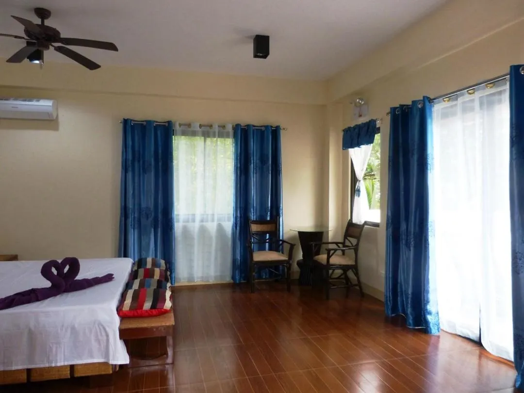 Bed in Sulu Sea Boutique Hotel