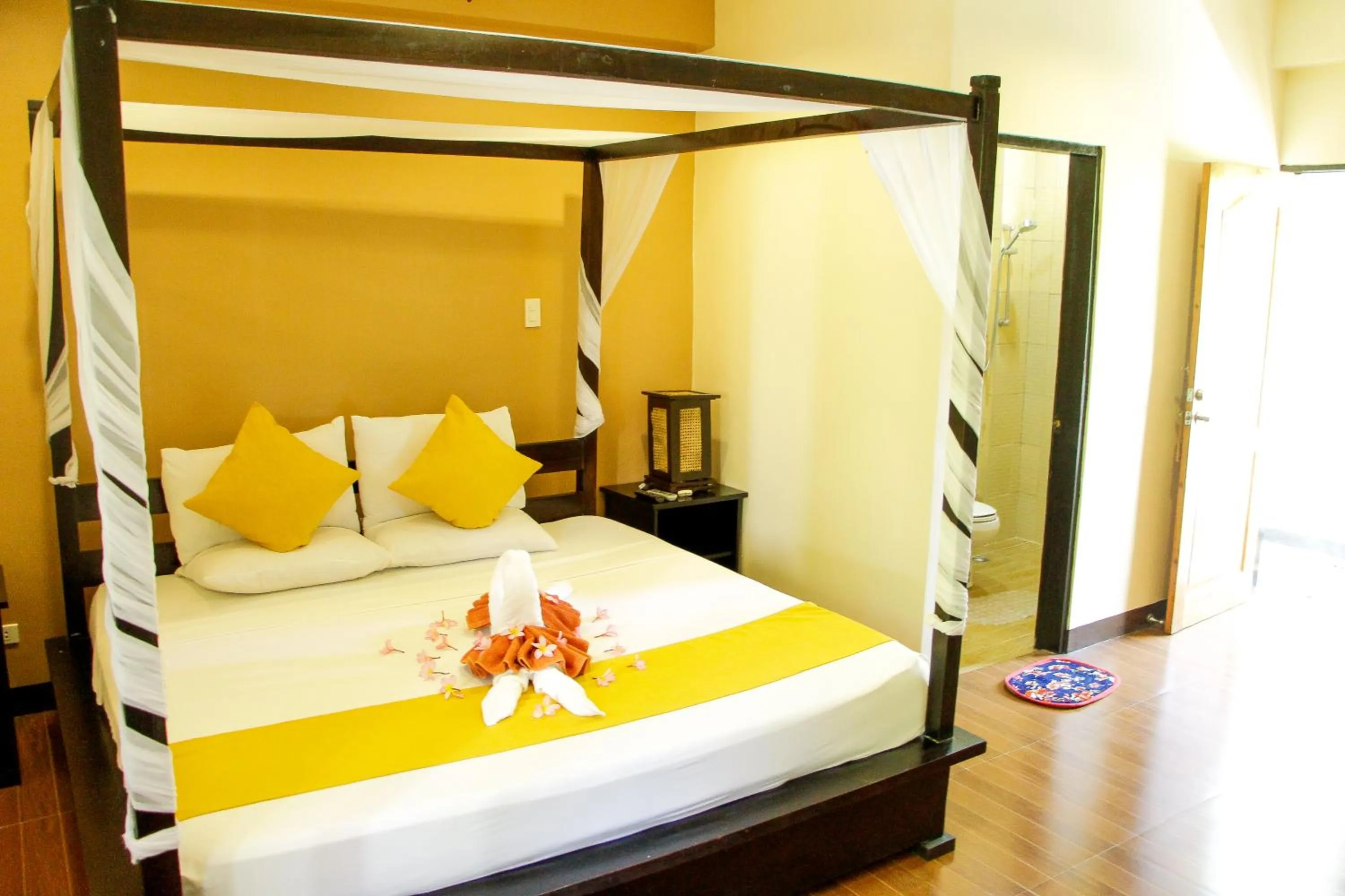 Bed in Sulu Sea Boutique Hotel