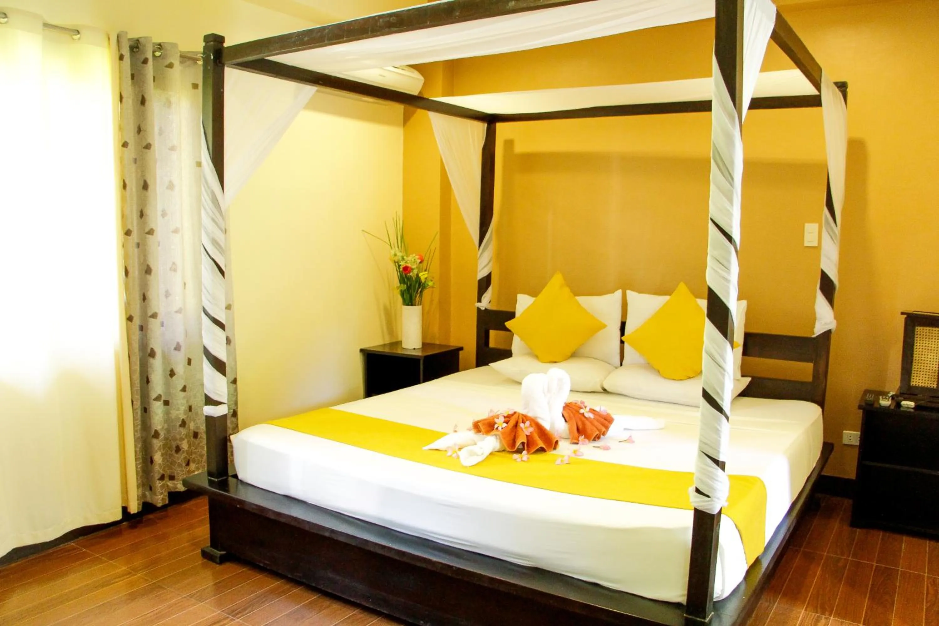 Bed in Sulu Sea Boutique Hotel
