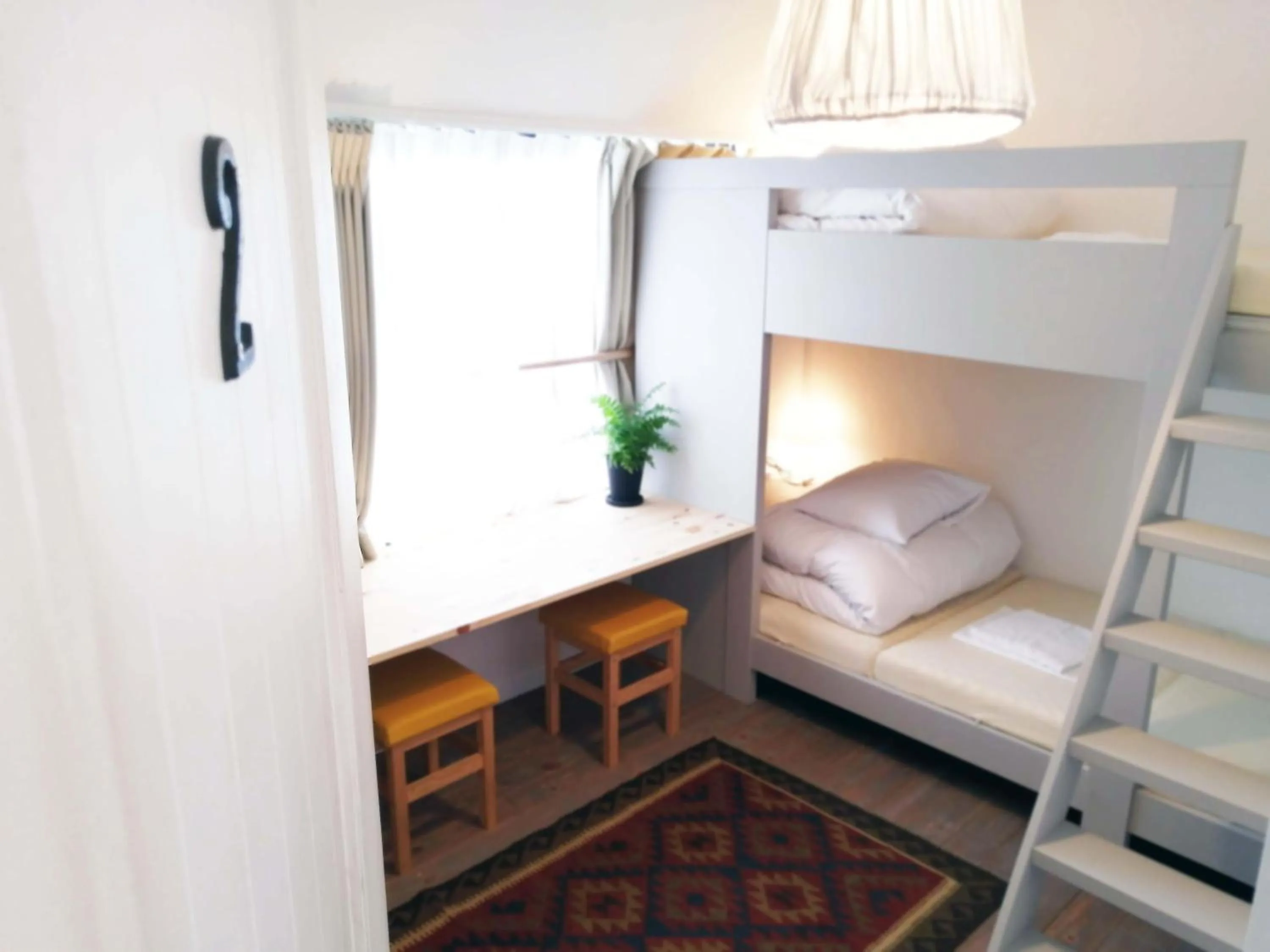 Decorative detail, Bed in Ten to Sen Guesthouse