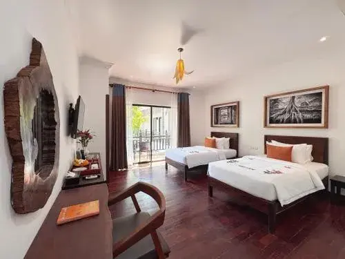 Deluxe Twin Room with Balcony and Pool View - single occupancy in Emerald Angkor Siem Reap Deluxe Twin Room with Balcony and Pool View - single occupancy in Emerald Angkor Siem Reap