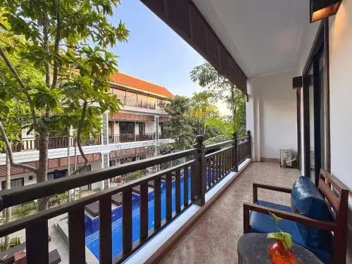 Deluxe Double Room with Balcony and Pool View - single occupancy in Emerald Angkor Siem Reap Deluxe Double Room with Balcony and Pool View - single occupancy in Emerald Angkor Siem Reap