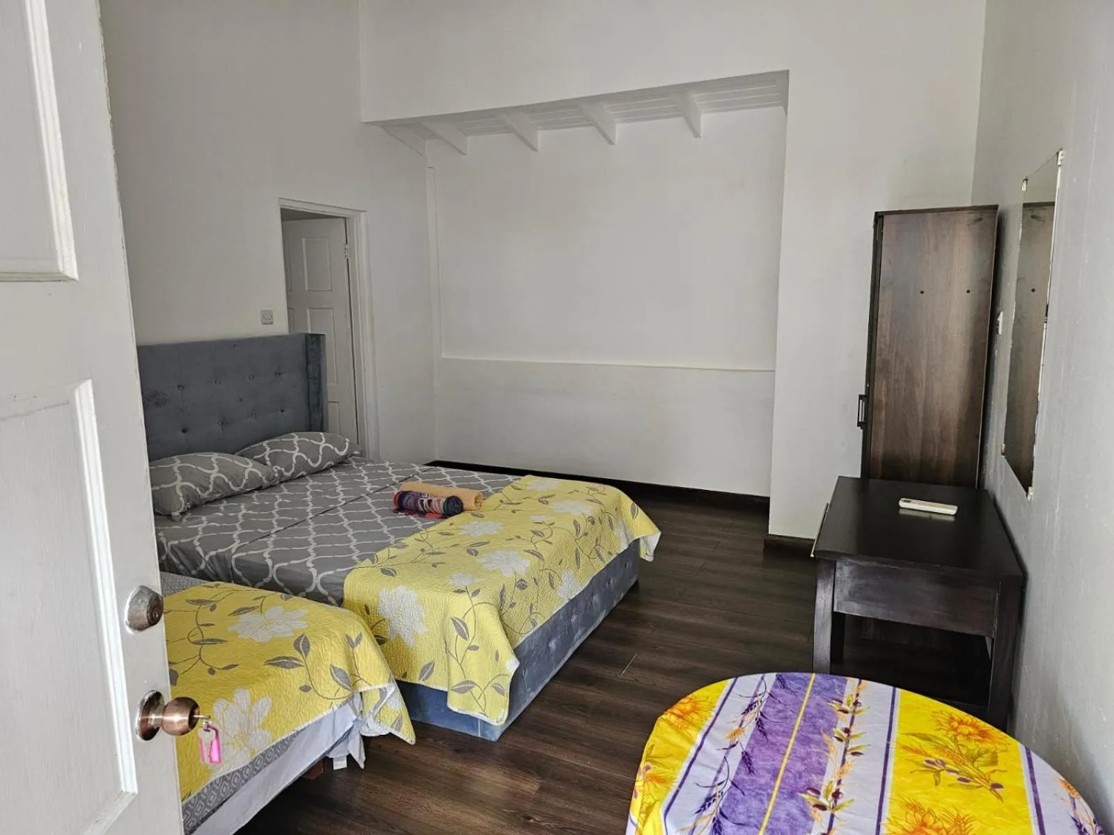 Bed in Wavecrest Suites