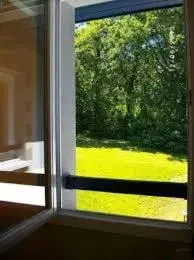 Garden view, Bed in IBIS BUDGET Biarritz - Anglet Garden view, Bed in IBIS BUDGET Biarritz - Anglet