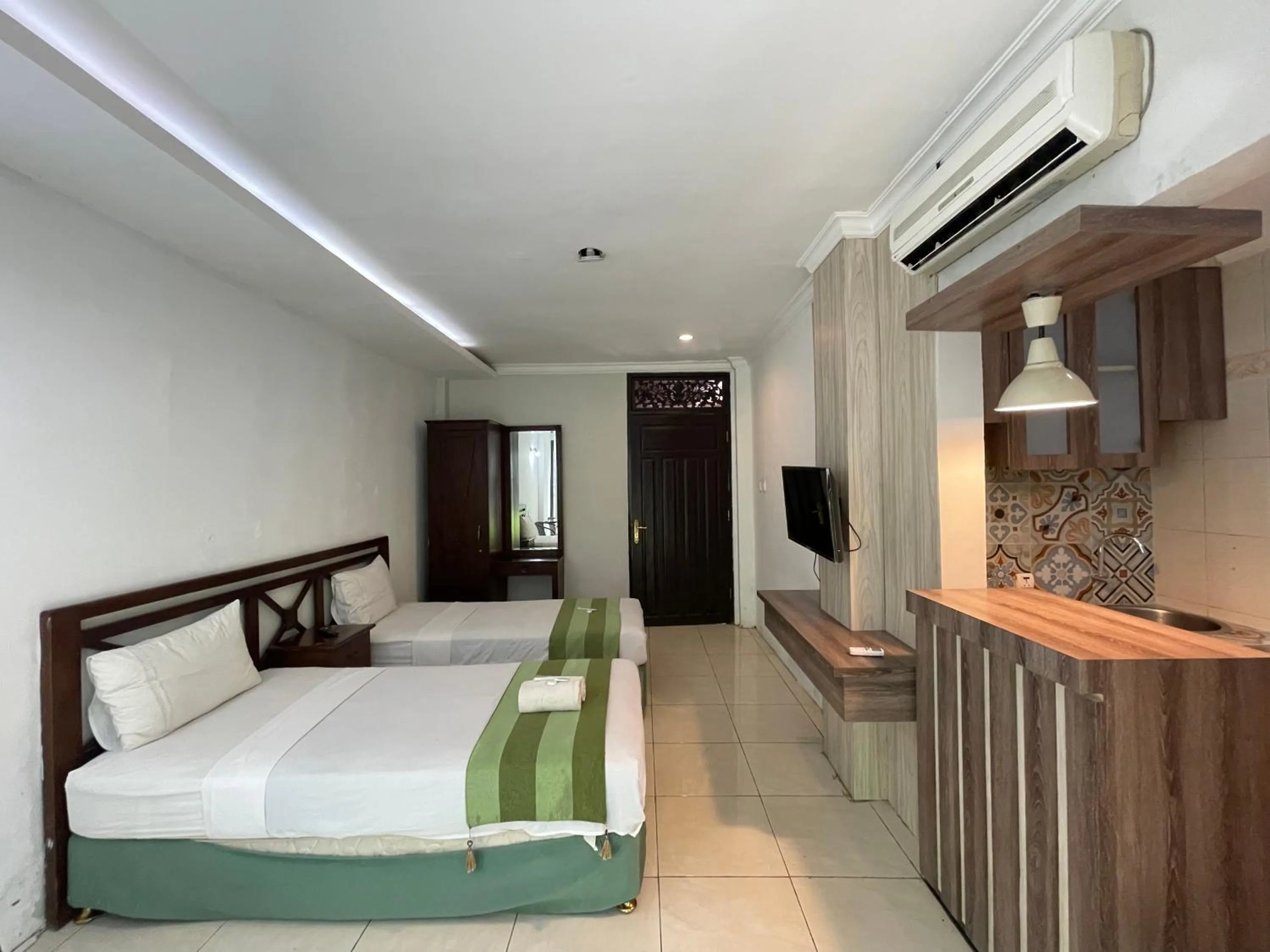 Bed in Klungkung Tower Hotel