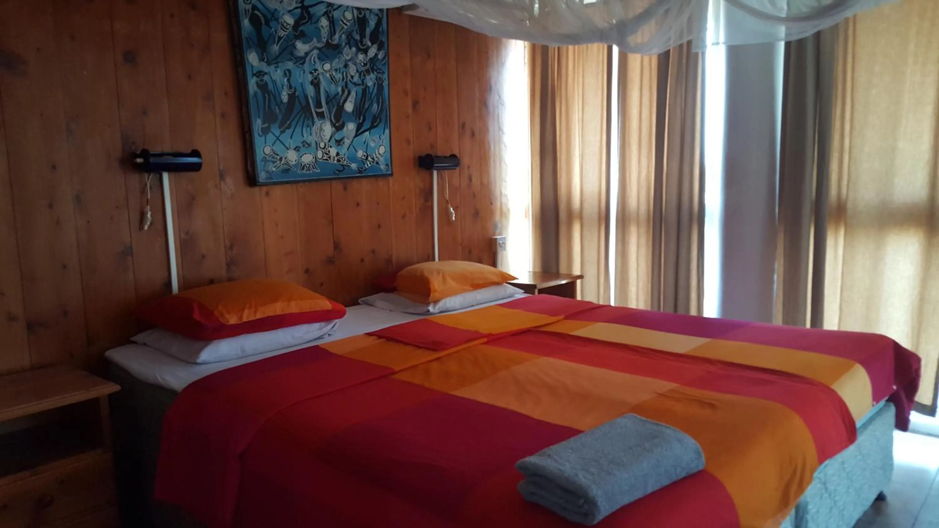 Bed in Q-Bar & Guesthouse