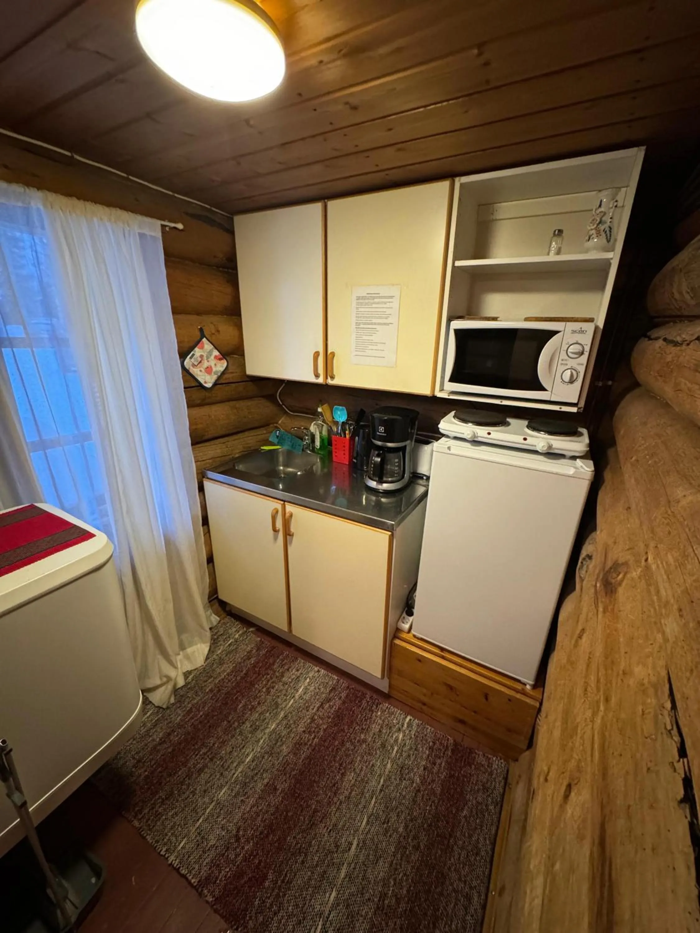 Kitchen or kitchenette in Cottages RukaTupa