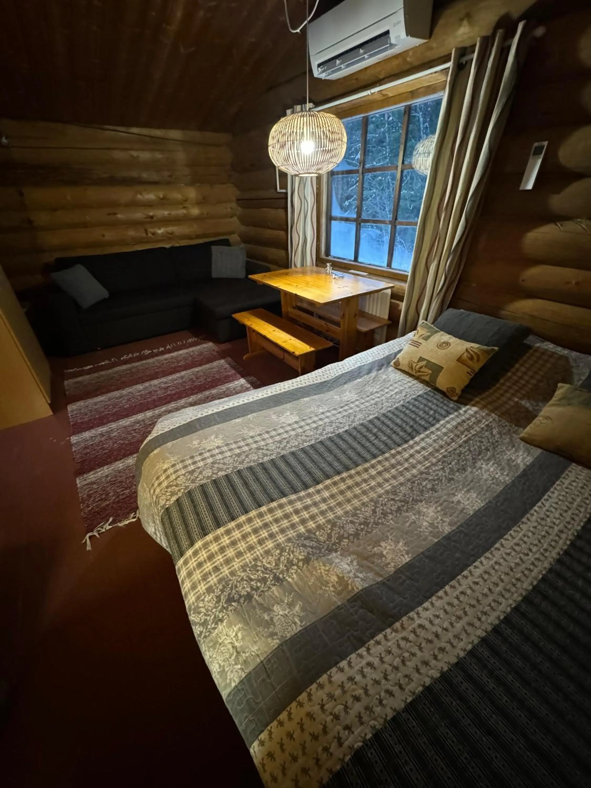 Photo of the whole room, Bed in Cottages RukaTupa