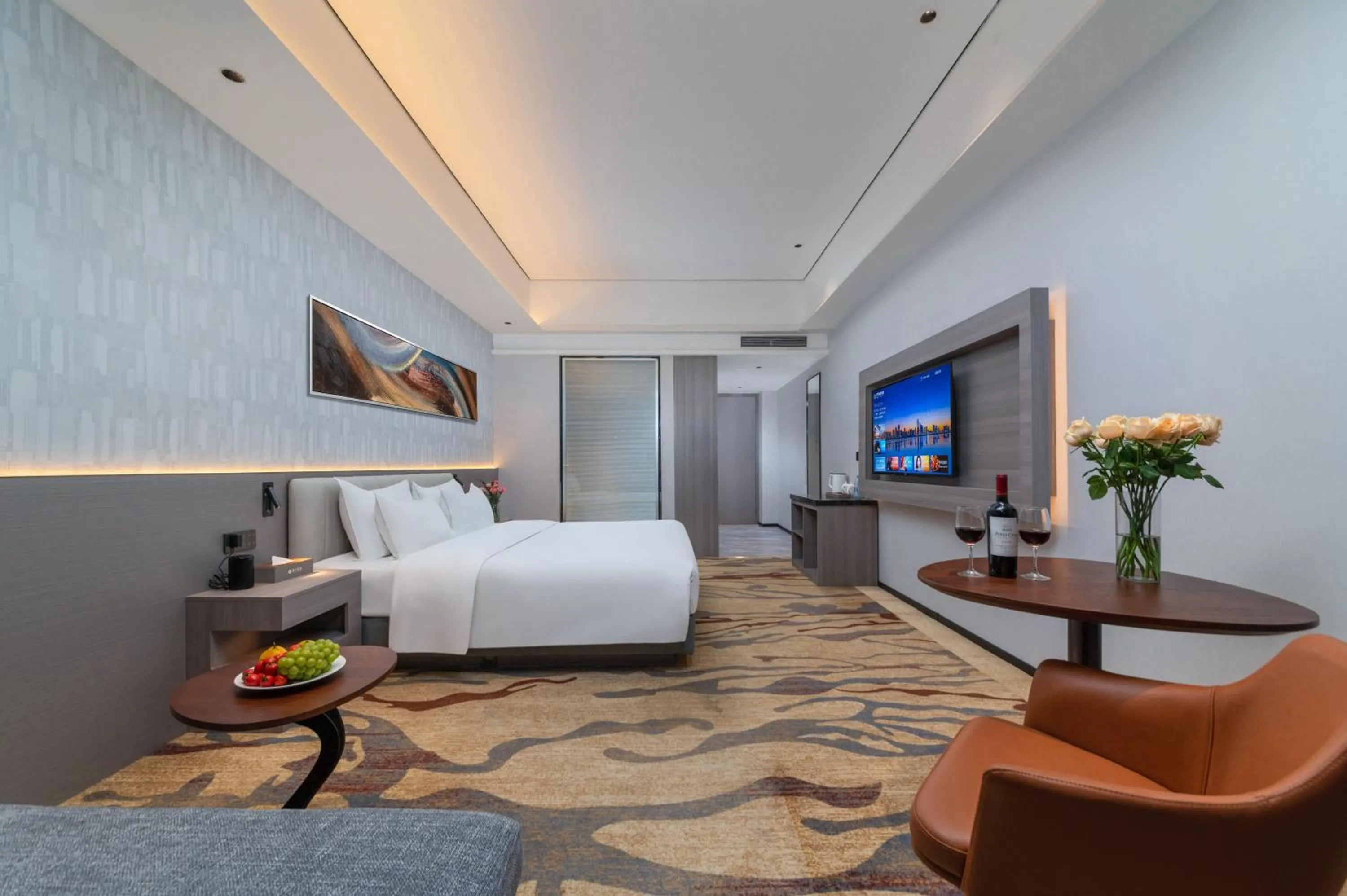Communal lounge/ TV room, Bed in Treasure Island Hotel HUMEN