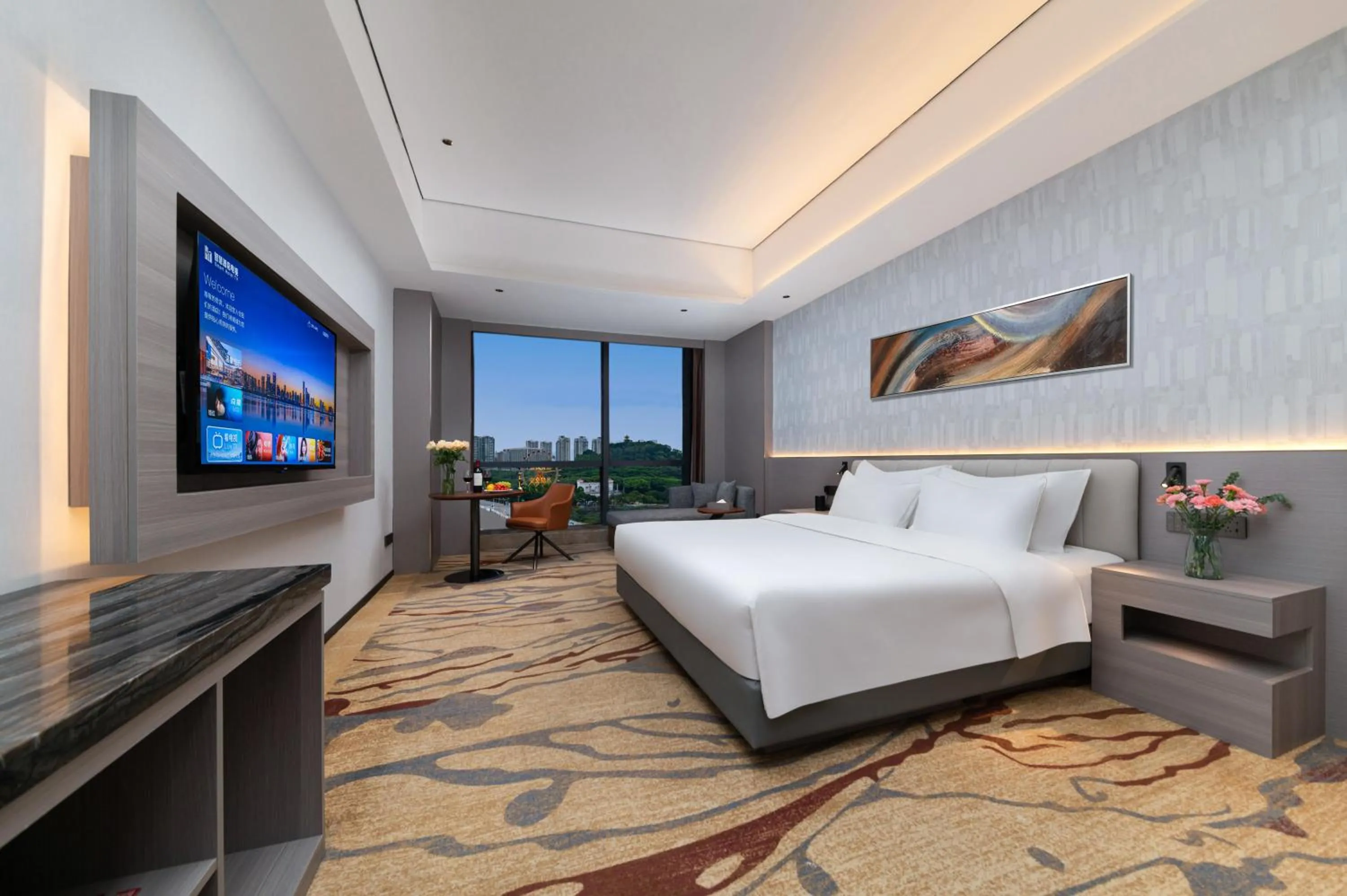 Communal lounge/ TV room, Bed in Treasure Island Hotel HUMEN