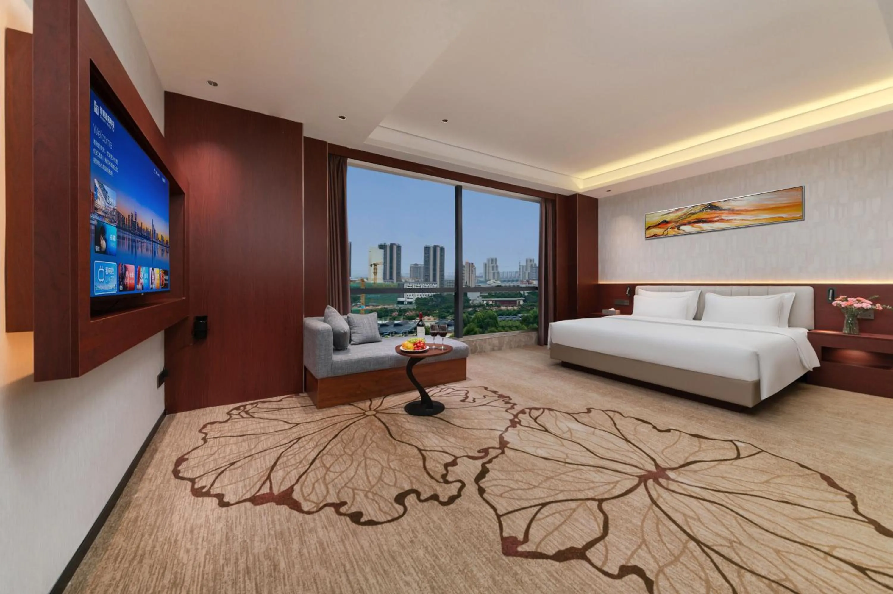 Communal lounge/ TV room, Bed in Treasure Island Hotel HUMEN