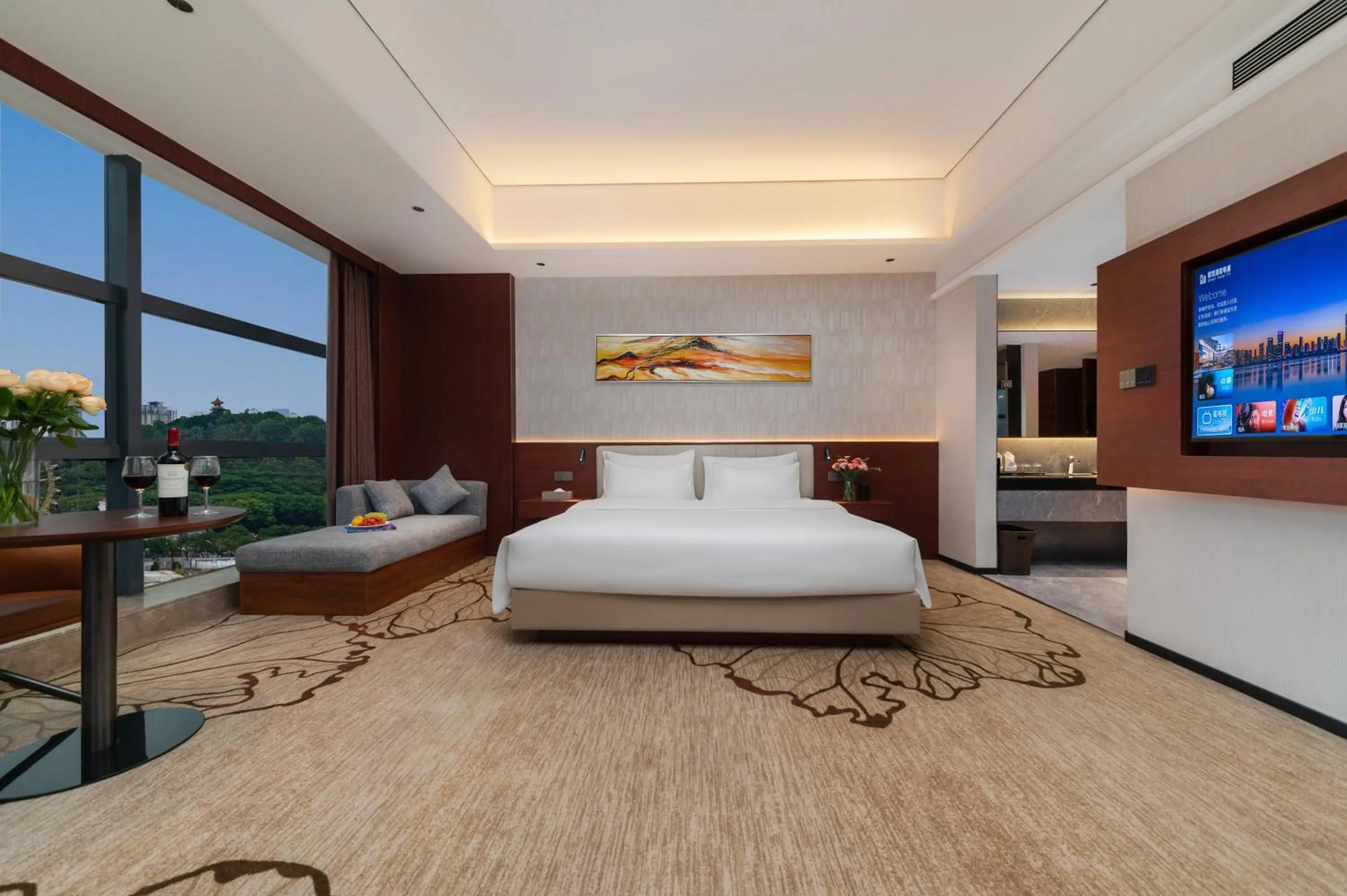 Communal lounge/ TV room, Bed in Treasure Island Hotel HUMEN