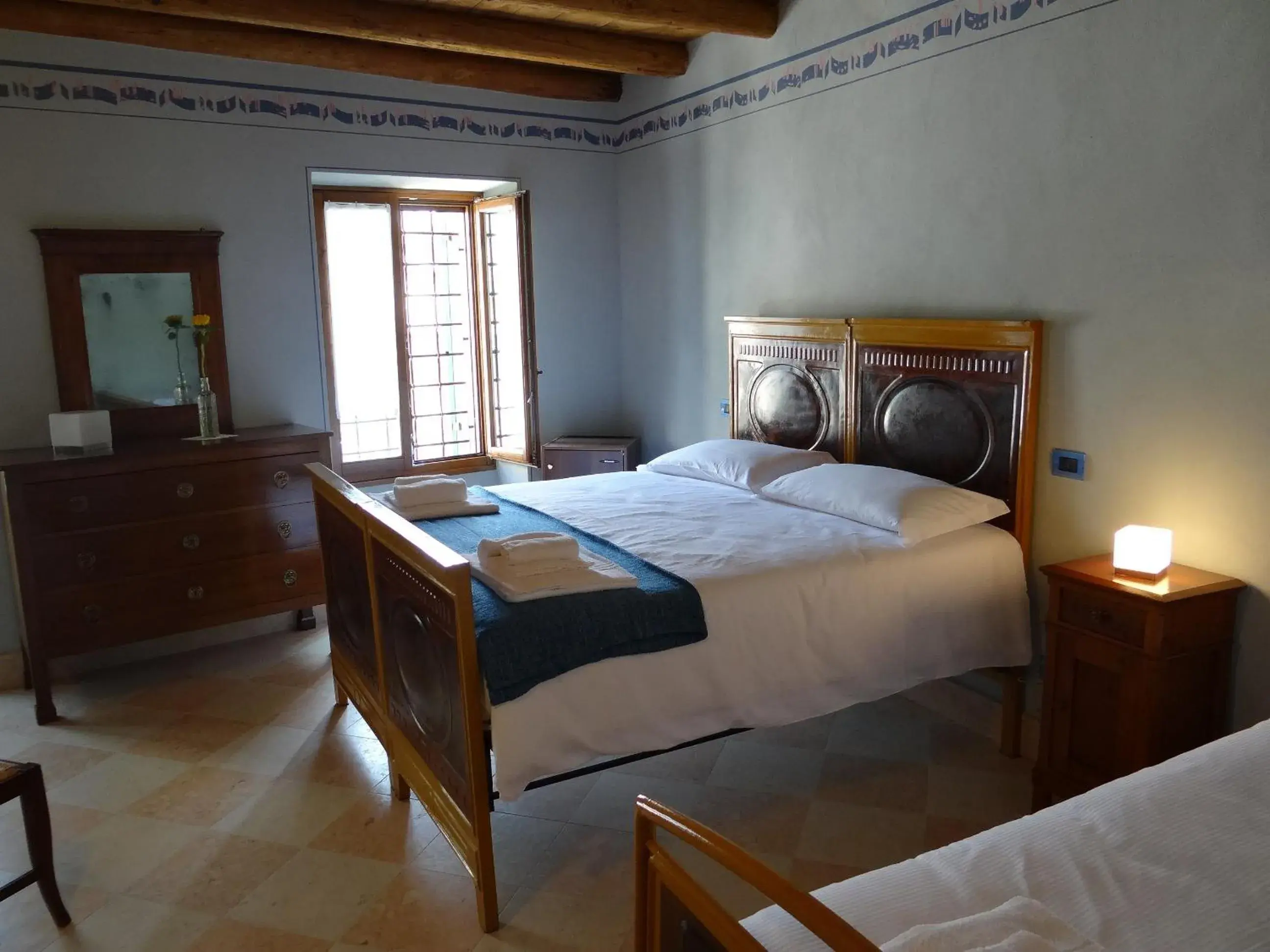 Triple Room with Private Bathroom - single occupancy in Le Camere Della Bice Triple Room with Private Bathroom - single occupancy in Le Camere Della Bice