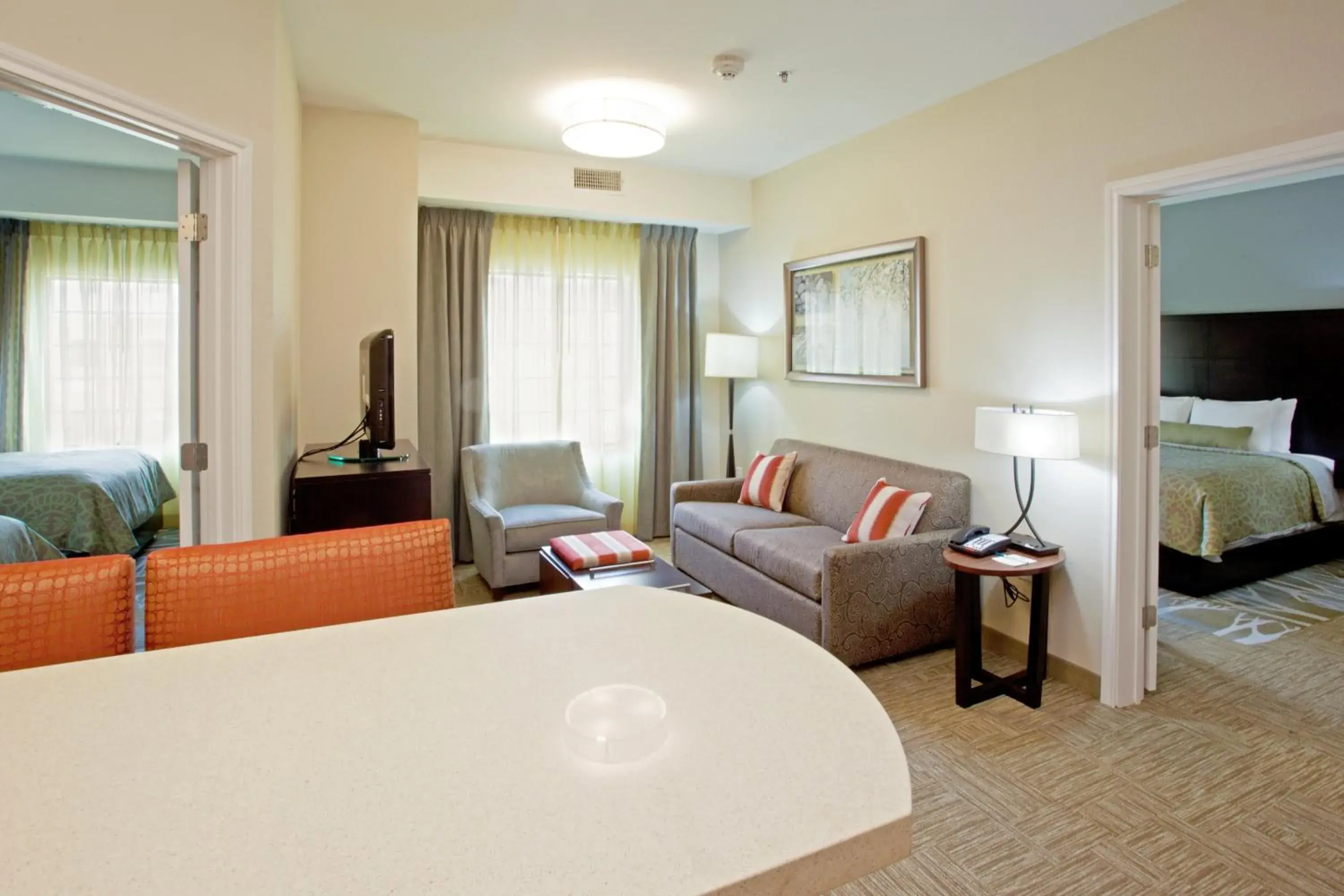 Seating area, Bed in Staybridge Suites Austin North - Parmer Lane, an IHG Hotel Seating area, Bed in Staybridge Suites Austin North - Parmer Lane, an IHG Hotel