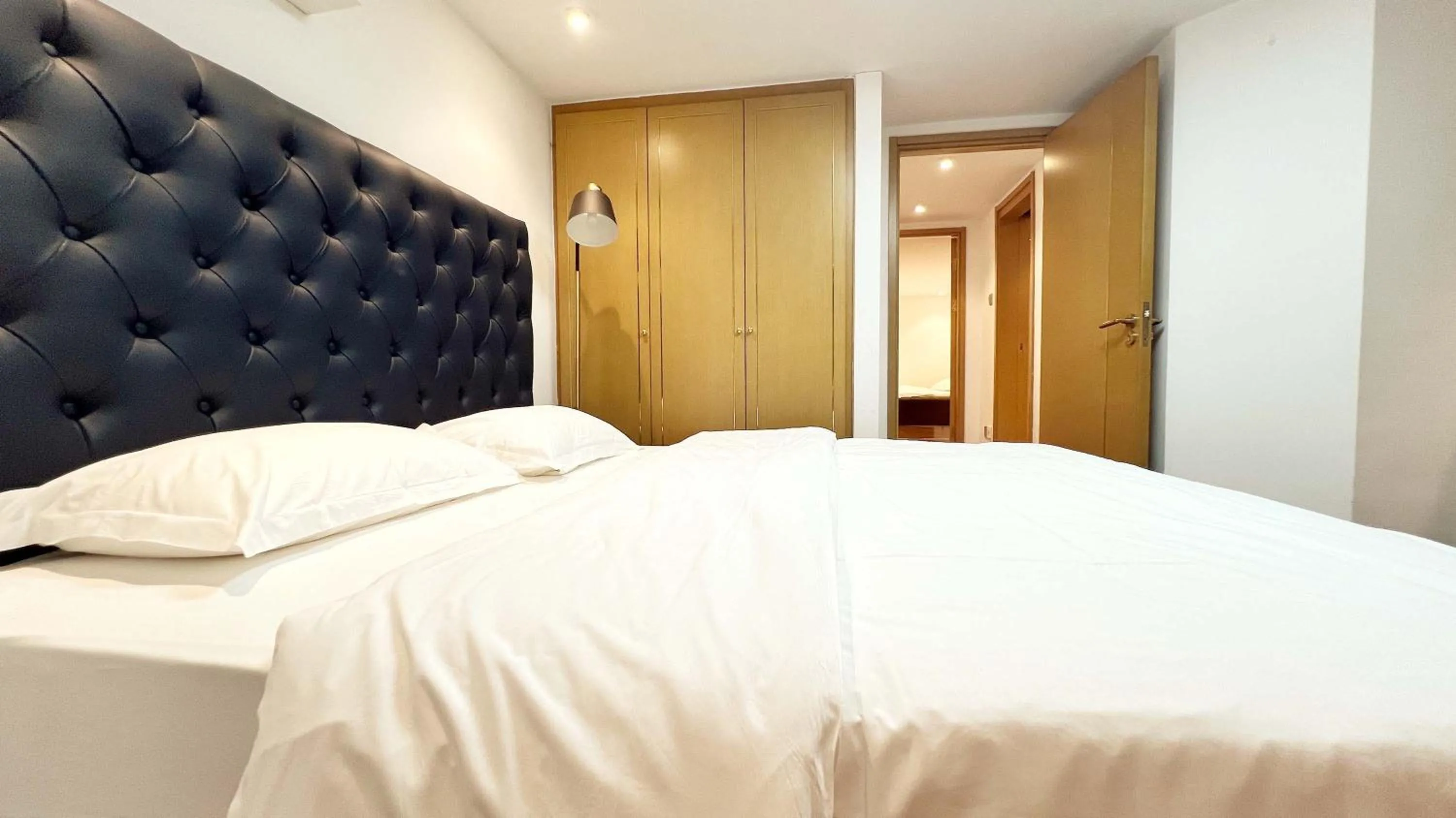 Bed in Hongqiao Aegean Sea LOFT Apartment