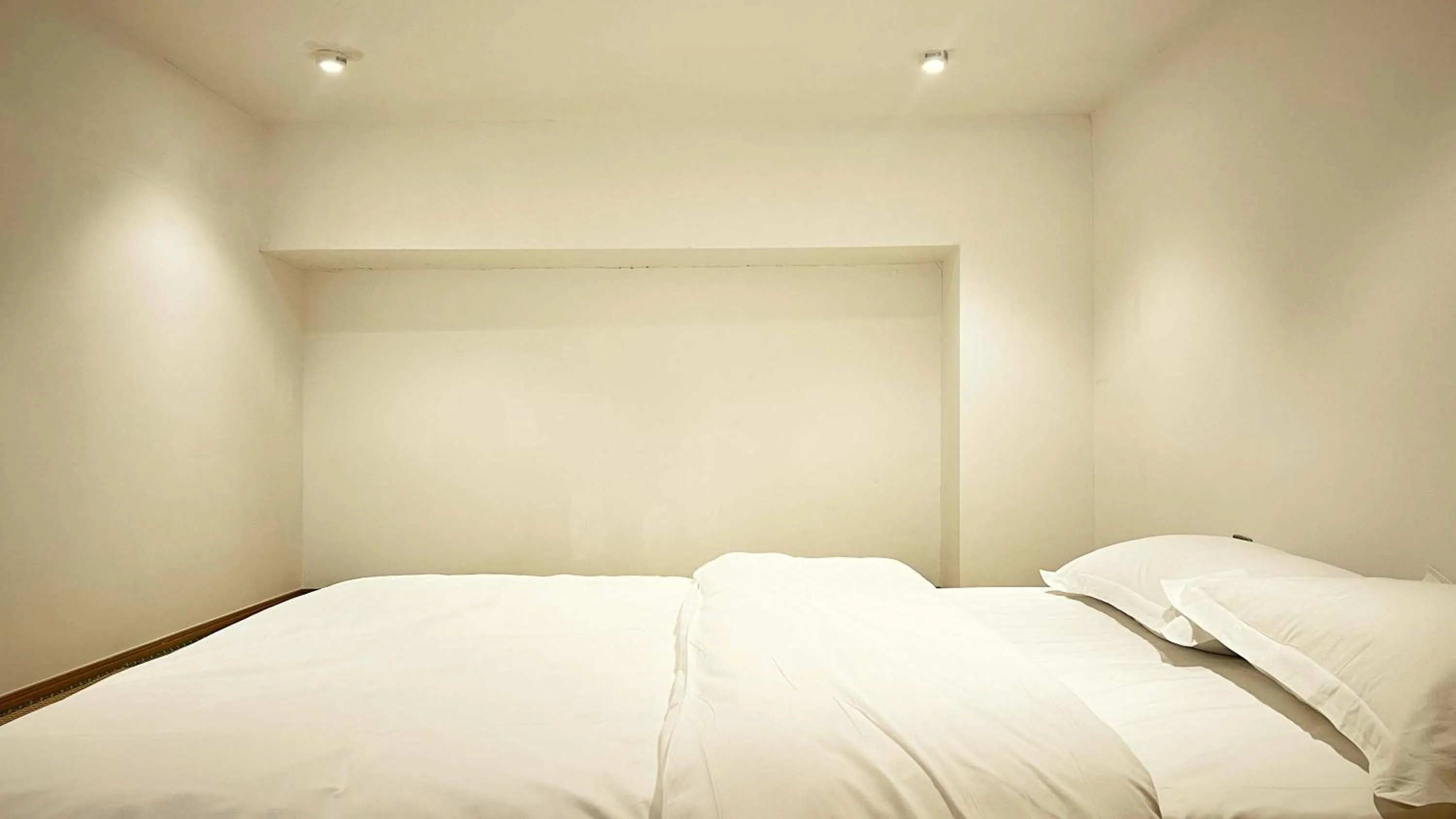 Bed in Hongqiao Aegean Sea LOFT Apartment