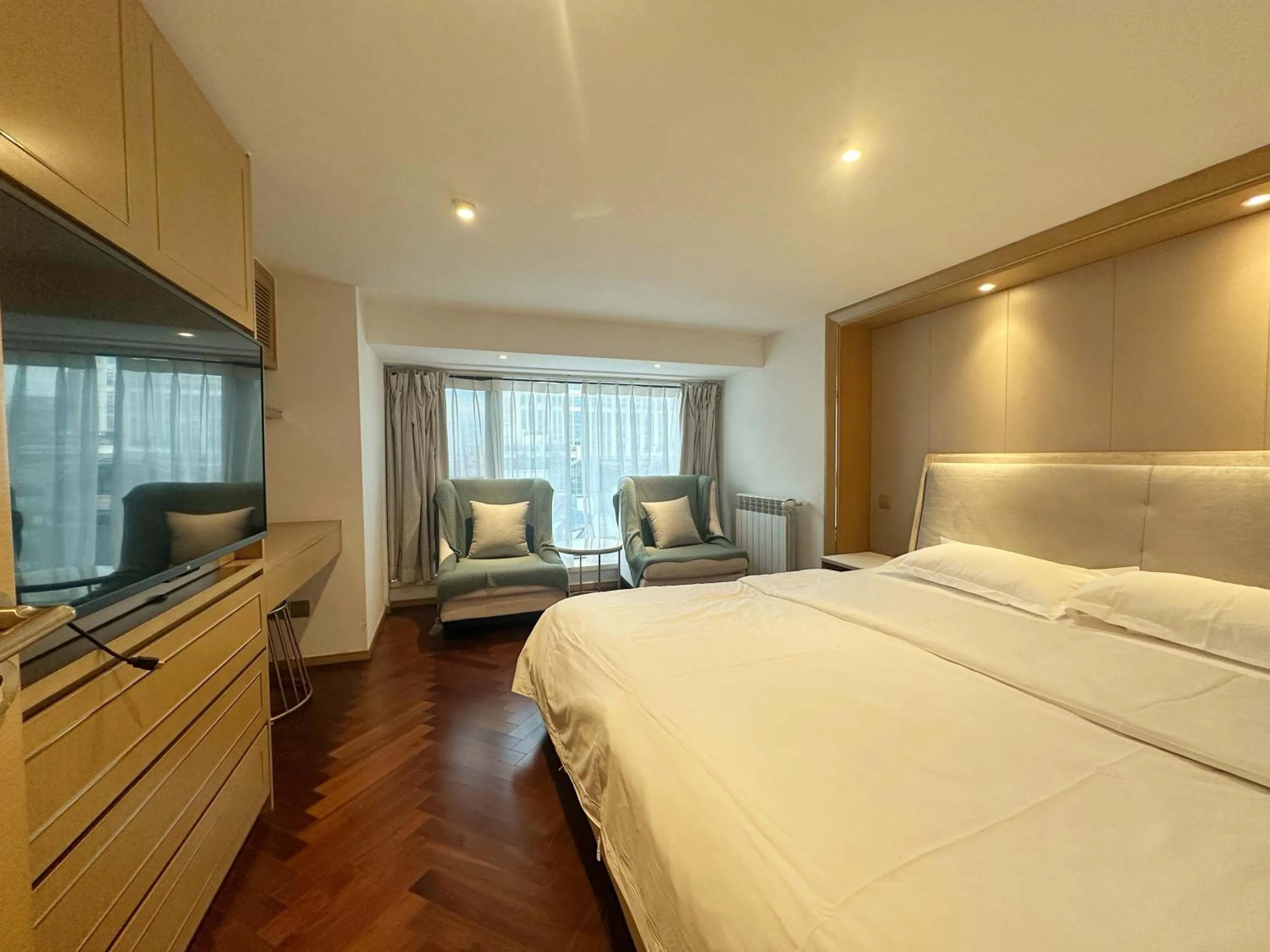 Bed in Hongqiao Aegean Sea LOFT Apartment
