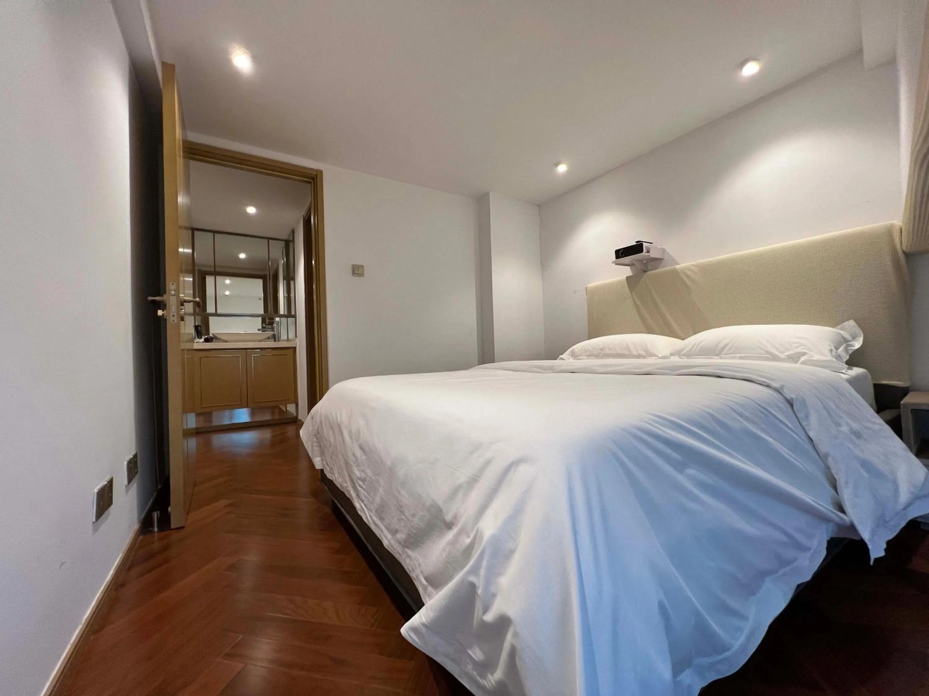 Bed in Hongqiao Aegean Sea LOFT Apartment