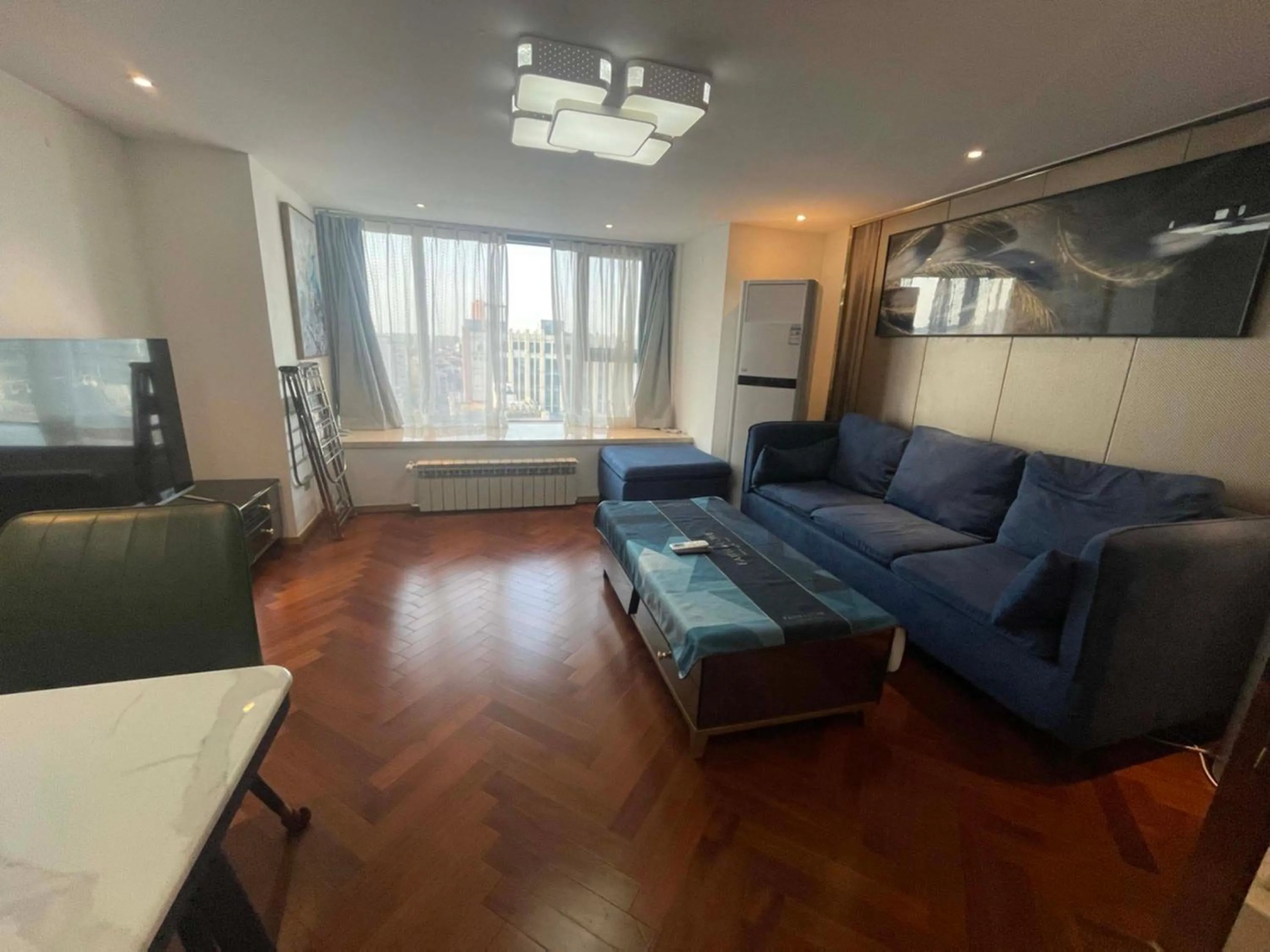 TV and multimedia in Hongqiao Aegean Sea LOFT Apartment