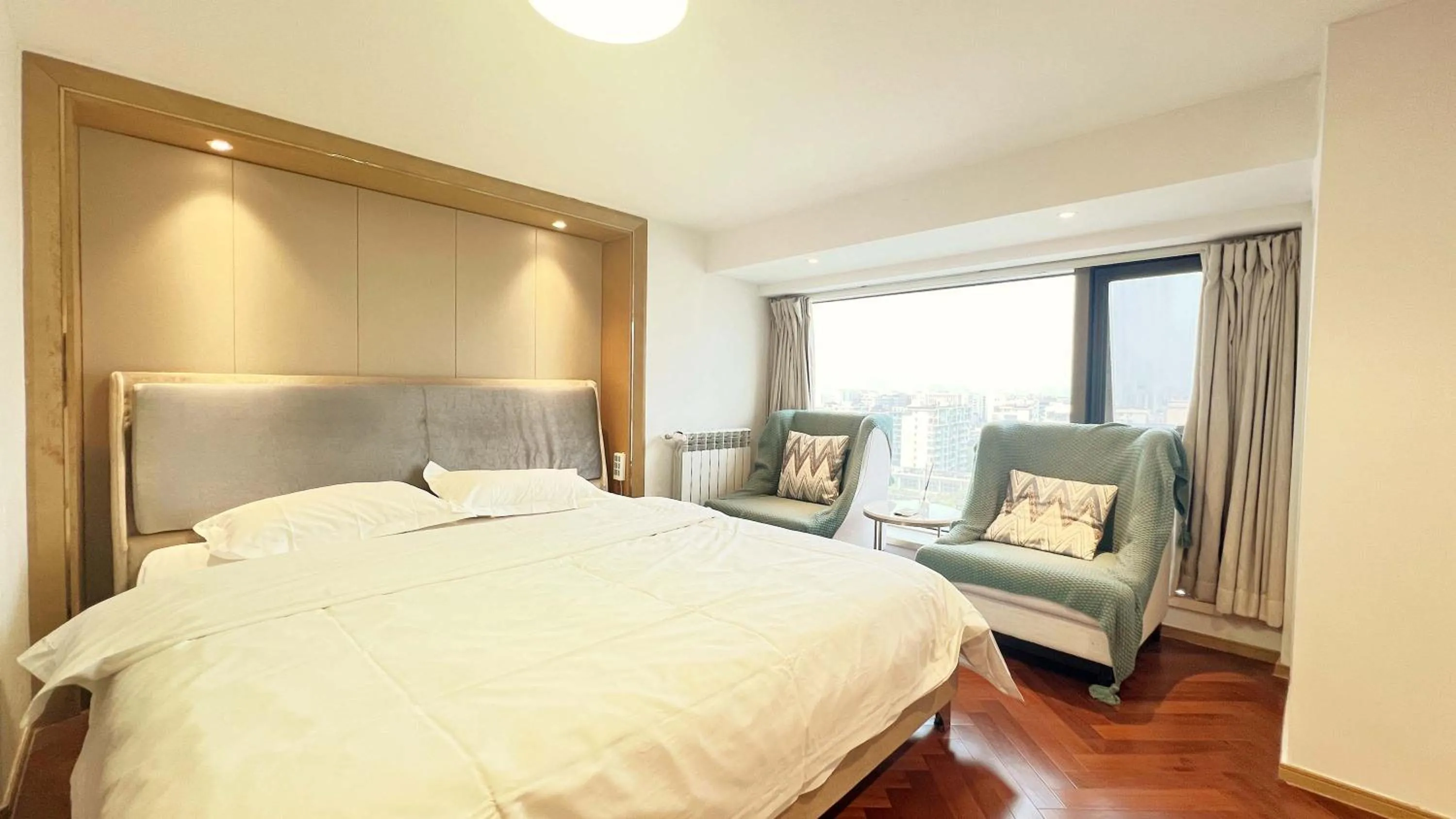 Bed in Hongqiao Aegean Sea LOFT Apartment