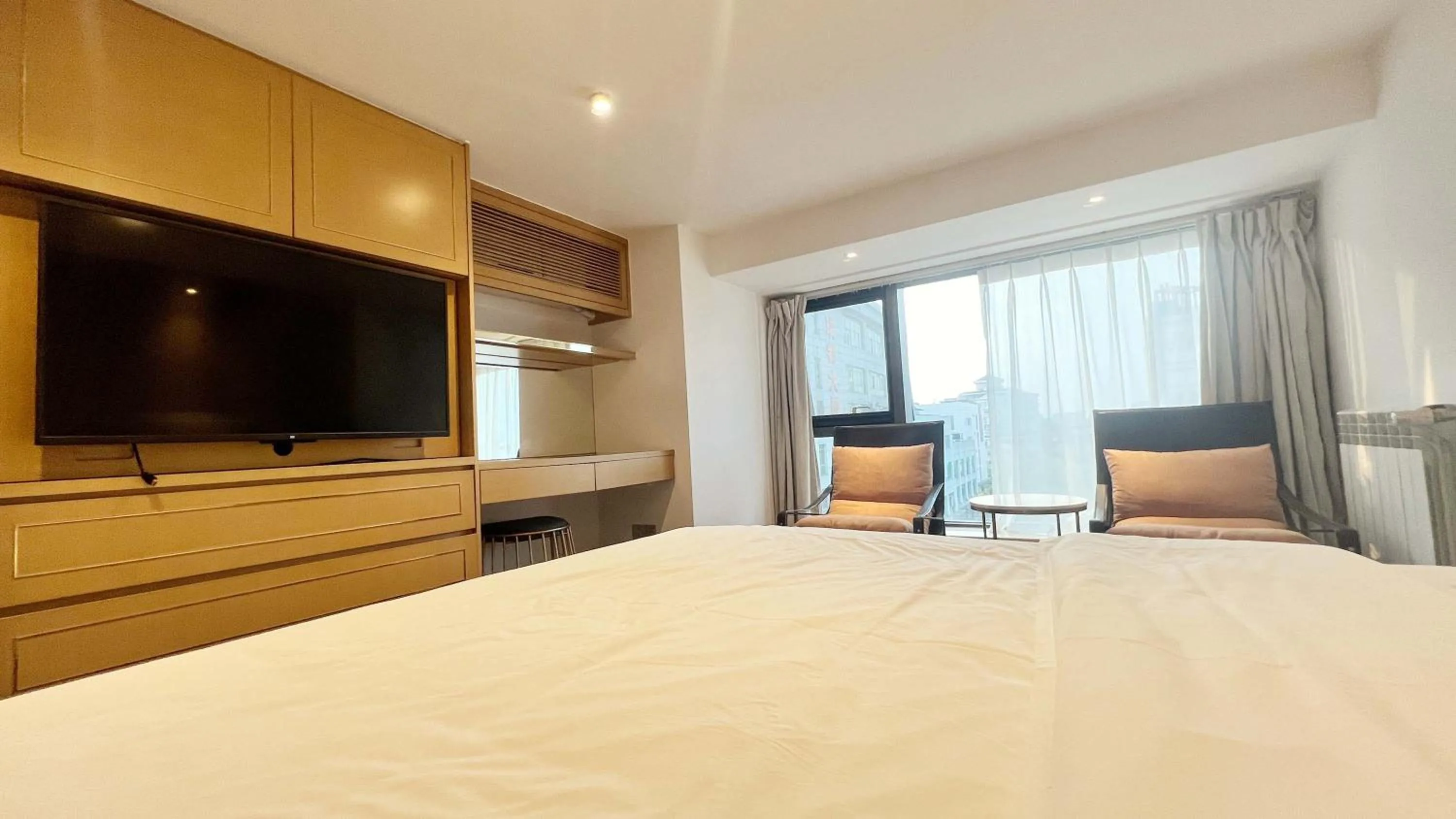 Bed in Hongqiao Aegean Sea LOFT Apartment