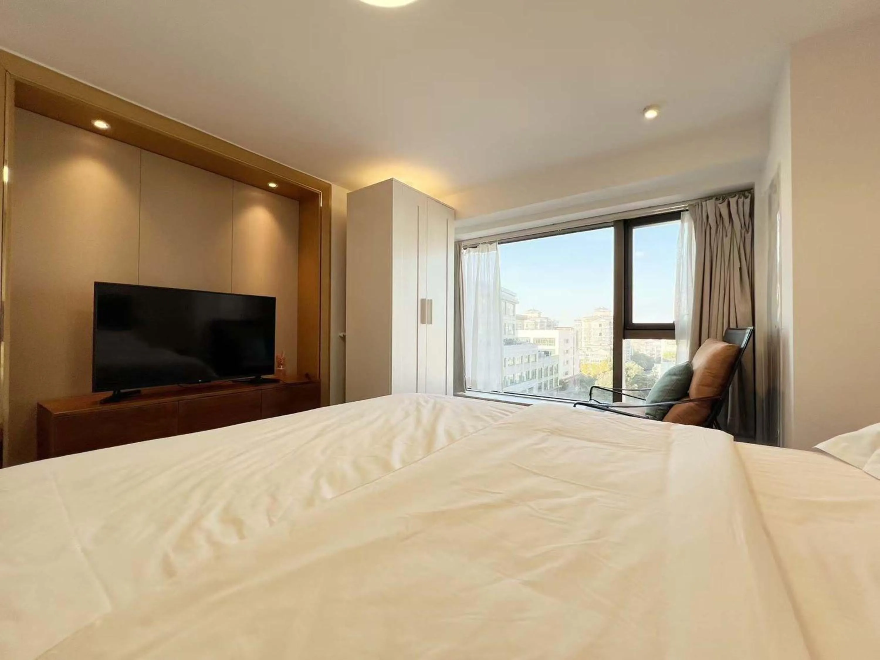 Photo of the whole room, Bed in Hongqiao Aegean Sea LOFT Apartment