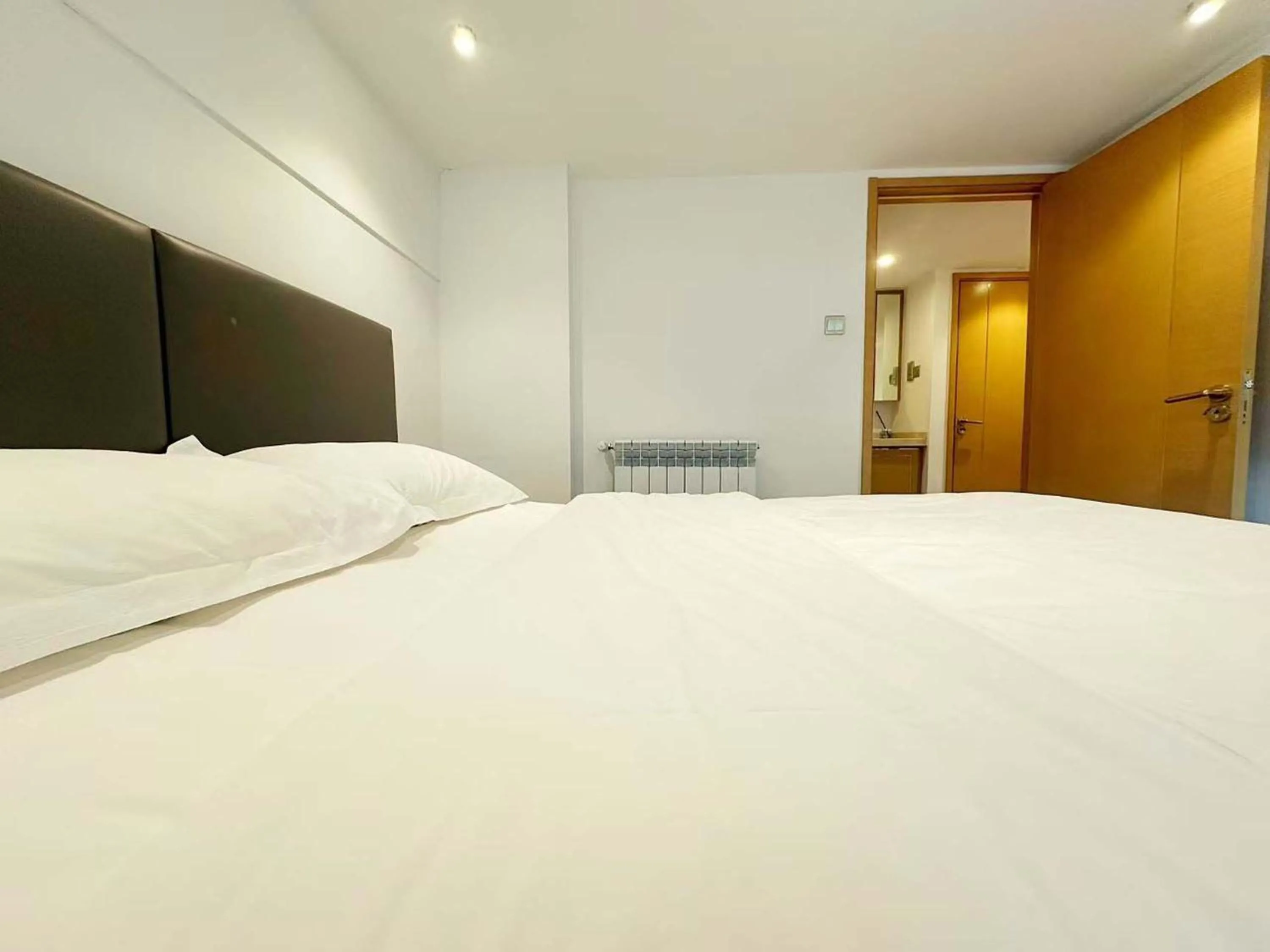 Bed in Hongqiao Aegean Sea LOFT Apartment