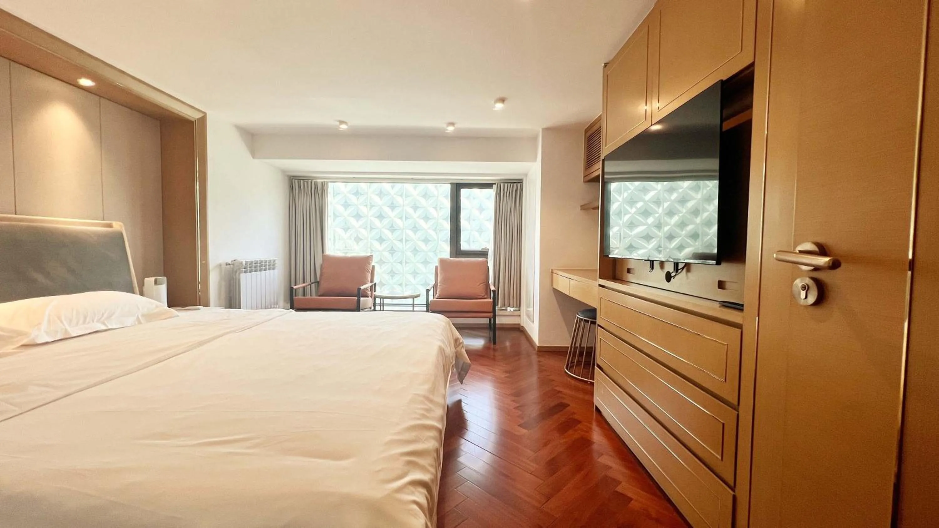 Bed in Hongqiao Aegean Sea LOFT Apartment