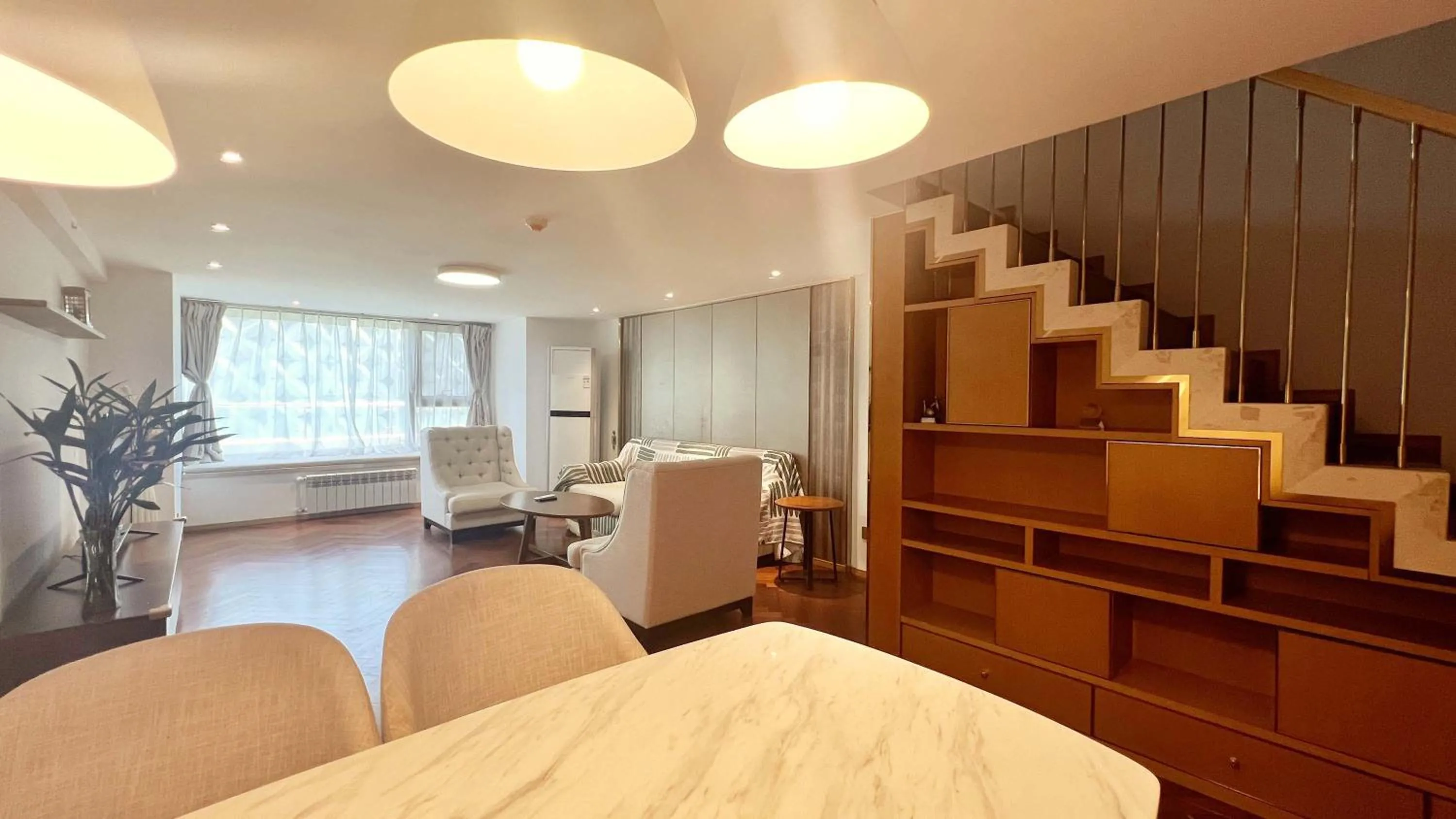 Bed in Hongqiao Aegean Sea LOFT Apartment