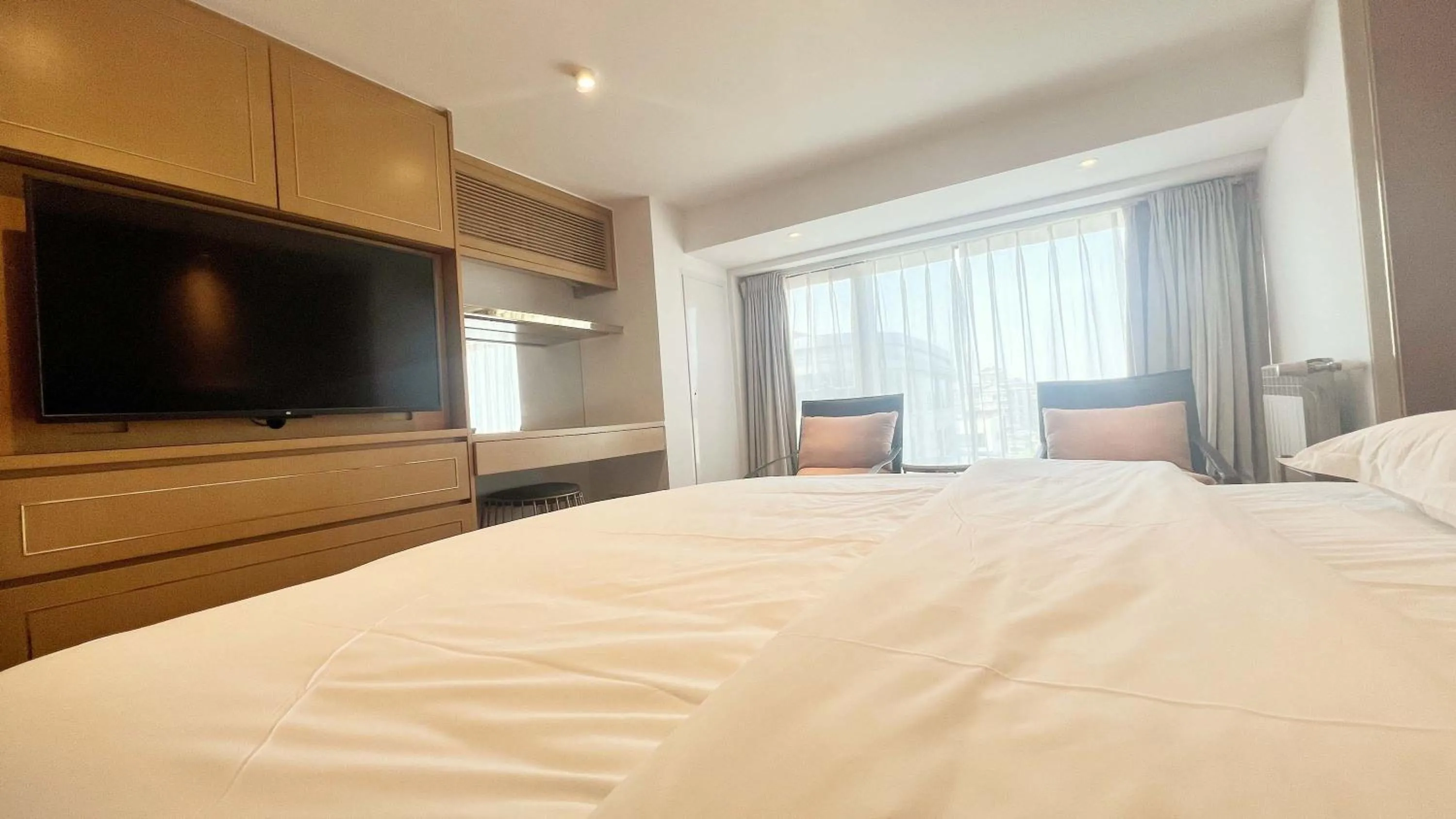 Bed in Hongqiao Aegean Sea LOFT Apartment