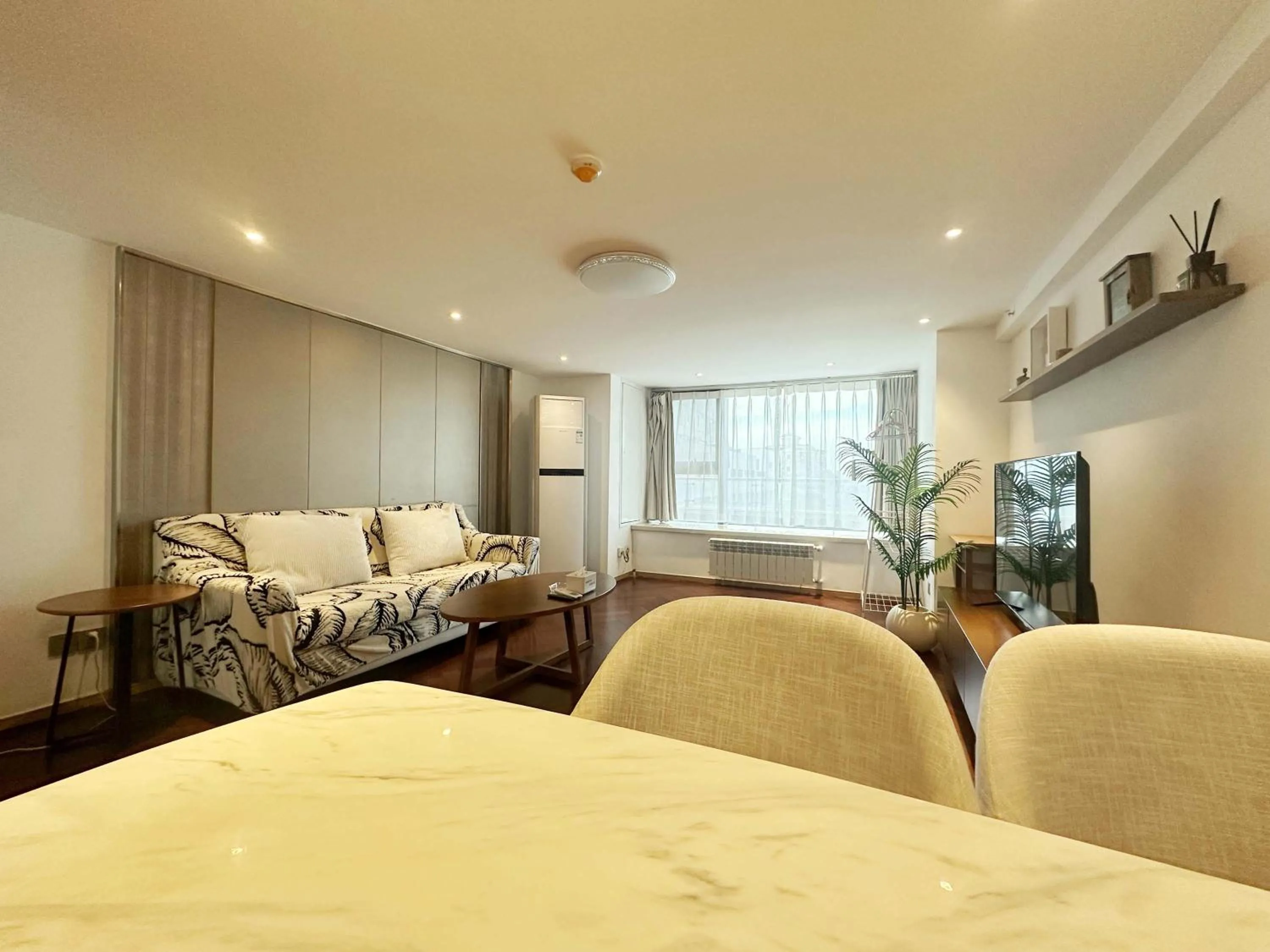 Bed in Hongqiao Aegean Sea LOFT Apartment
